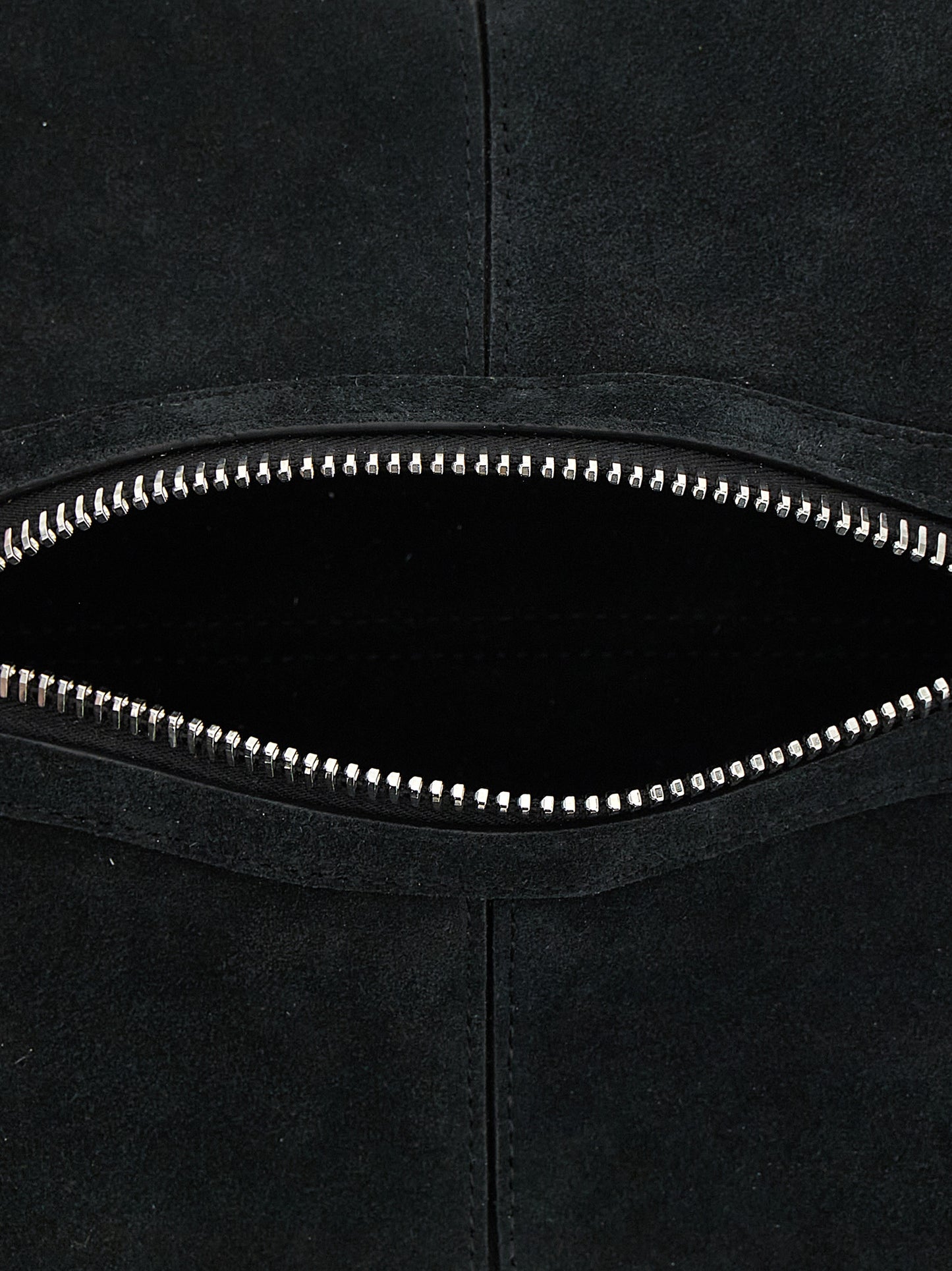 This Mini Handbag by Coperni for women in bos taurus calf suede leather and black presents a sculptural silhouette featuring a secure zipper, ample , and versatile handle for a sculptural finish.