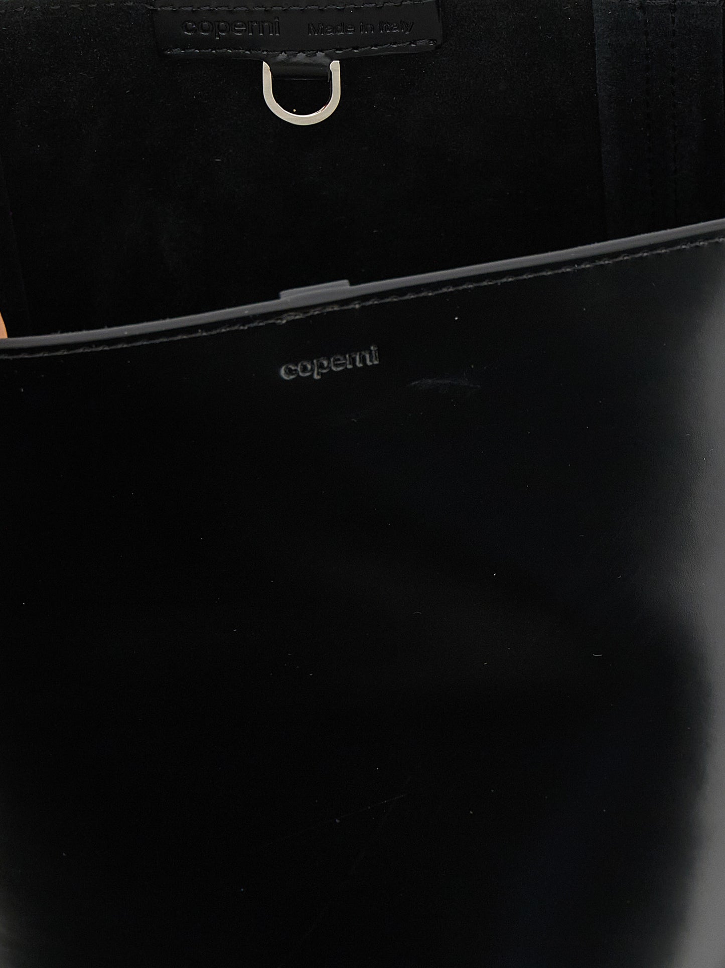 Shoulder Bucket Bag by Coperni for women in bos taurus calf suede leather black showcases a statuesque silhouette, artfully detailed with a secure , organized , and versatile shoulder-strap, adjustable-strap & handle for a statuesque look.
