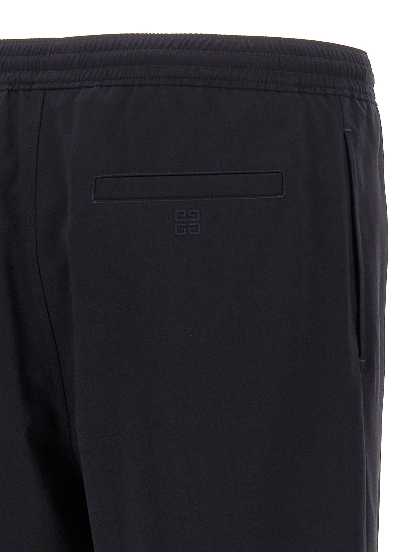 Bermuda Shorts by Givenchy for men in polyamide & wool blue features an tailored silhouette, showcasing a tailored with a short and for a sophisticated look.