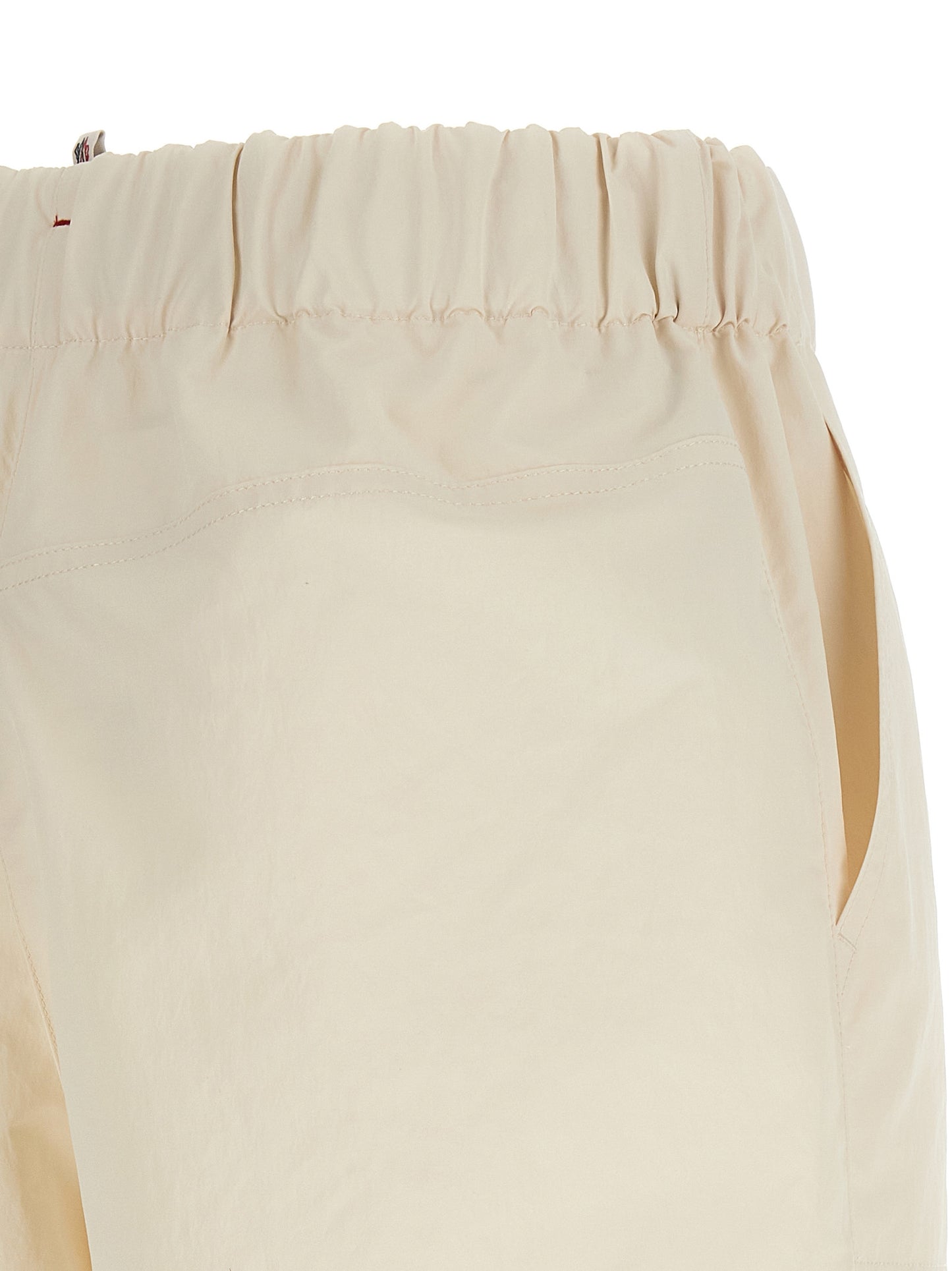 Bermuda Shorts by Moncler Grenoble for women in polyester white presents a contemporary silhouette, showcasing a contemporary with a refined short and elegant .