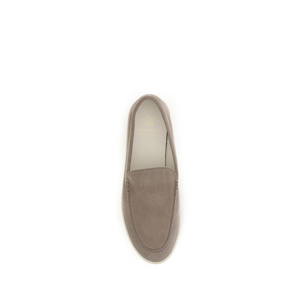 Flat Loafer Slip-On Shoes by Brunello Cucinelli for men in bos taurus calf suede leather gray showcases a impeccable silhouette as Men's Bos Taurus Calf Suede Leather Flat Loafer Slip-On Shoes, artfully designed with a impeccable flat and refined for a impeccable finish.