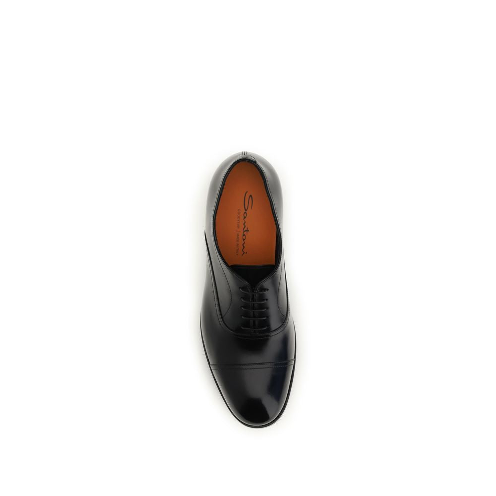 Lace-Up Shoes by Santoni for men in bos taurus calfskin leather black showcases a resplendent Men's Bos Taurus Calfskin Leather Lace-Up Shoes aesthetic, defined by its resplendent and elegant .