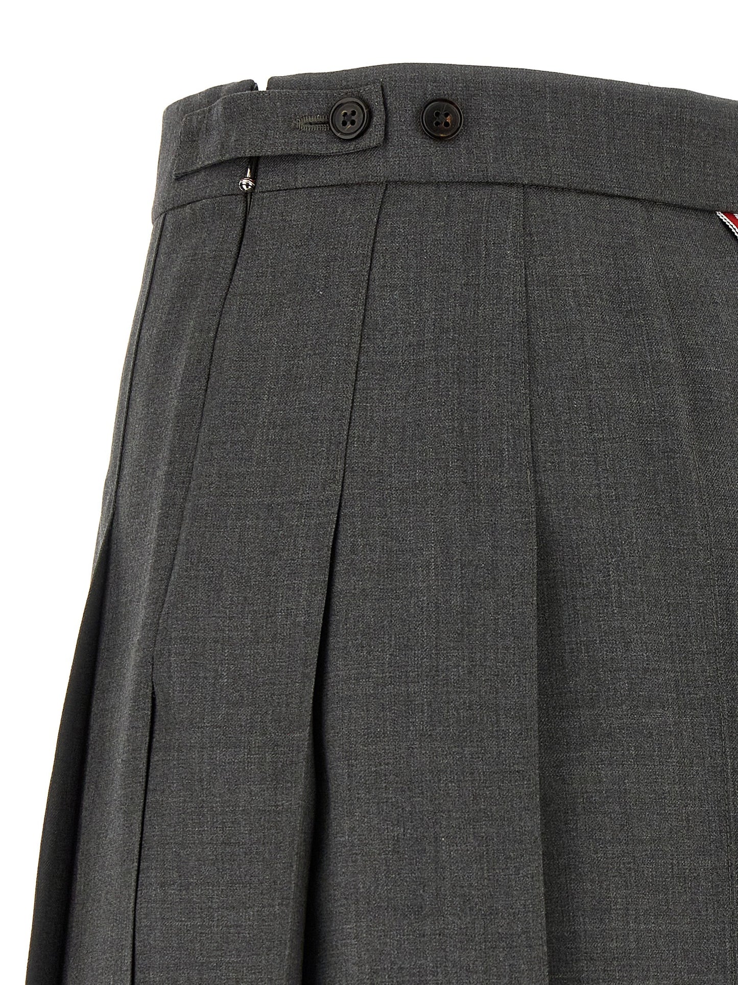 Skirt by Thom Browne for women in wool gray & signature features a contoured silhouette from the Waves Women's Pleated Wool Long Skirt collection, characterized by its contoured long for a contoured finish.