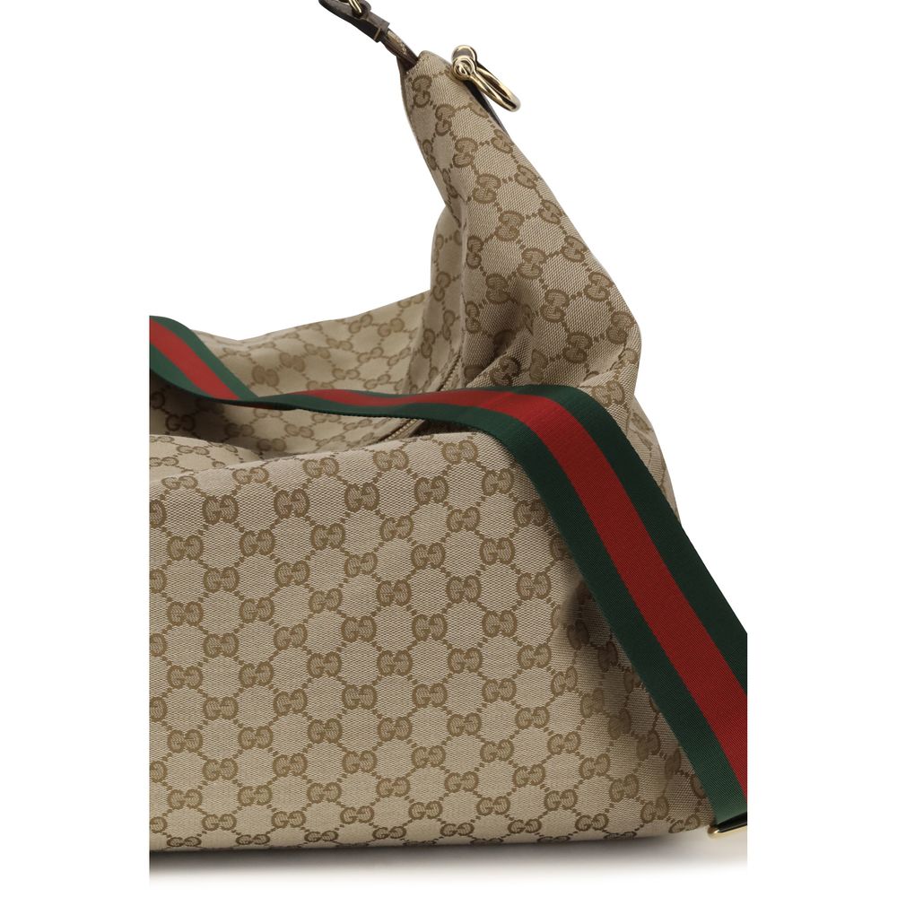 Large Shoulder Bag by Gucci for men in nylon faux leather & canvas beige, gold & signature features a enviable silhouette, showcasing a secure zipper, ample , and enviable shoulder-strap, adjustable-strap, detachable-strap & handle for a enviable finish.