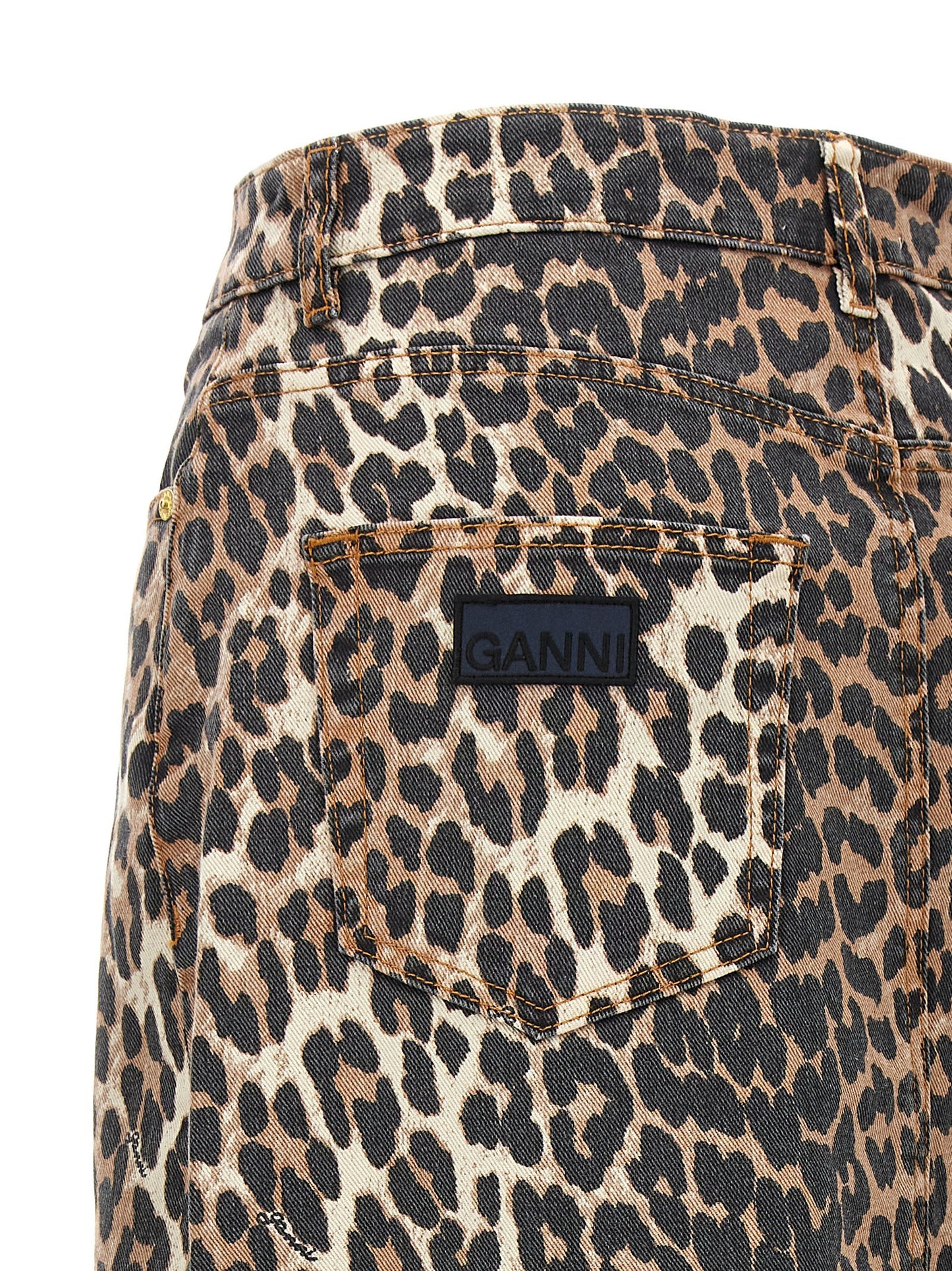 Skirt by Ganni for women in stretch organic cotton denim brown & print showcases a dramatic silhouette, artfully capturing the essence of the 9 To 5 Women's Denim Stretch Organic Cotton Skirt in a dramatic mini cut for a refined look.