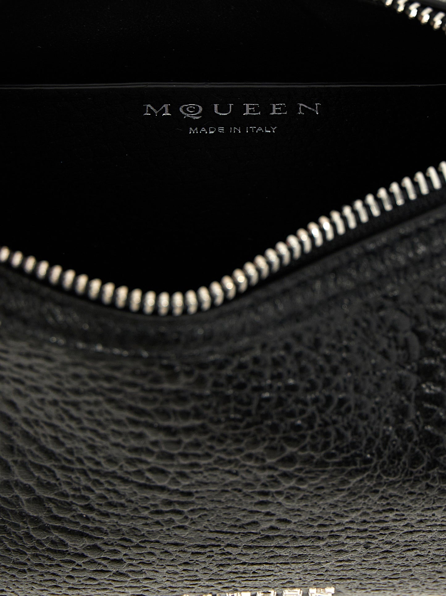 Mini Handbag by Alexander McQueen for women in lamb leather black features a ornamental silhouette, showcasing a secure zipper & hook, ample , and ornamental handle for a sophisticated look.