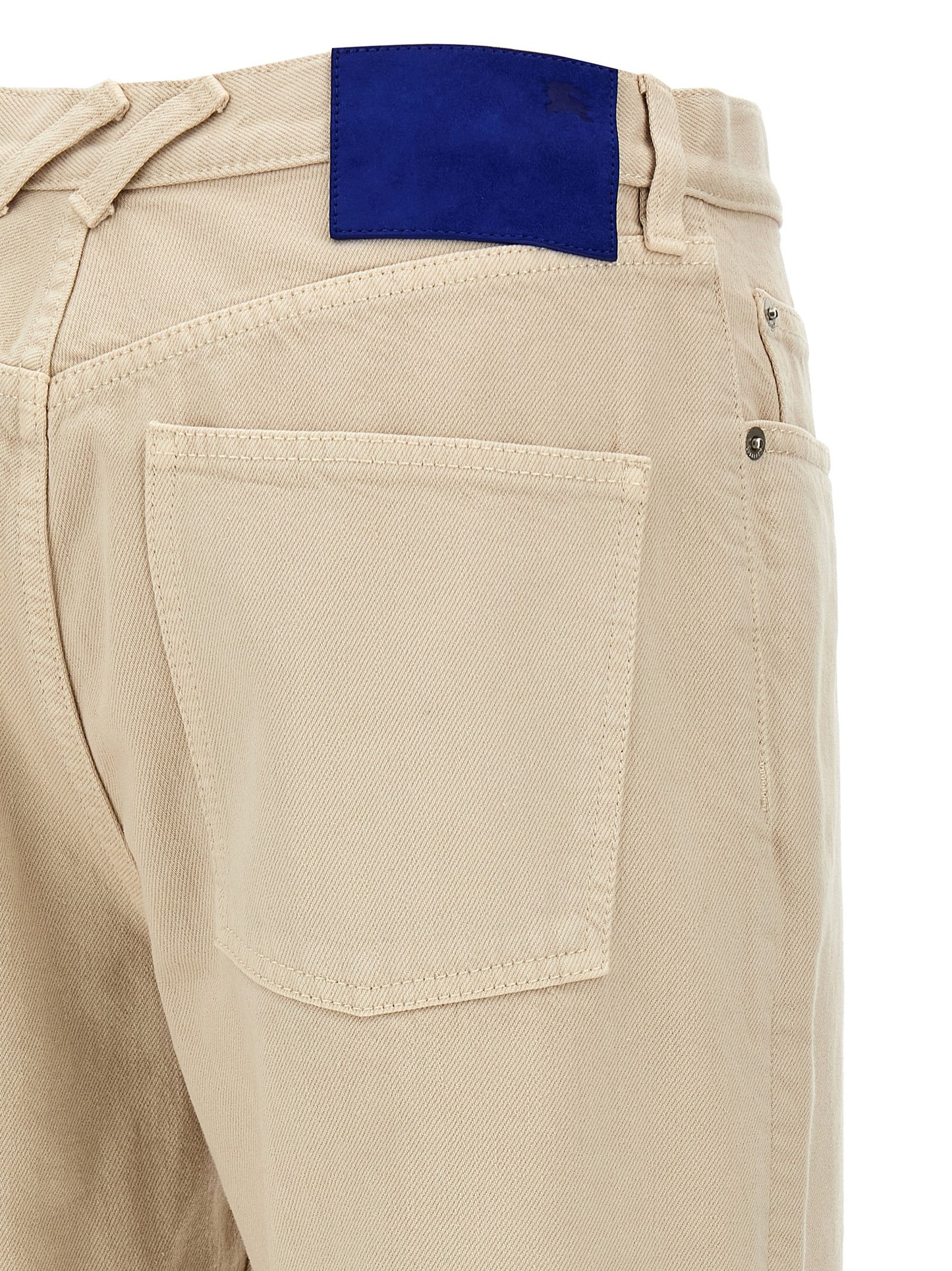 Jeans by Burberry for women in denim cotton & suede leather beige presents a tailored silhouette, showcasing a tailored straight-leg and long cut with a refined for a truly tailored aesthetic.