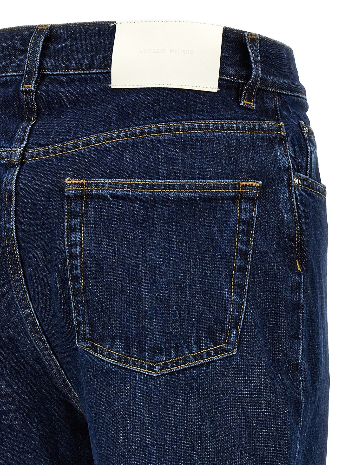 Jeans by Loulou De Saison for women in organic denim cotton & leather blue presents a tailored silhouette, showcasing a tailored straight-leg and long cut with a refined high rise for a truly tailored aesthetic.