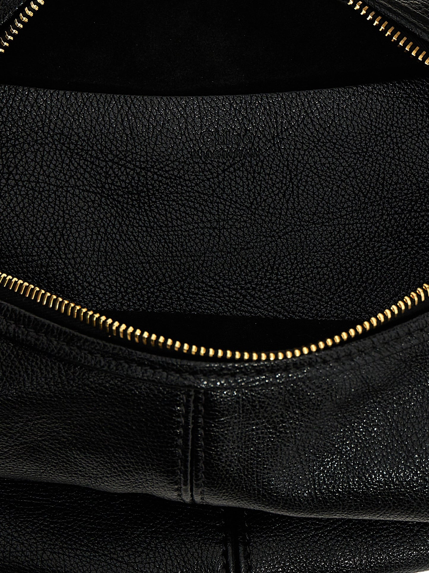 Hobo Handbag by Chloé for women in calfskin leather black presents a ornamental silhouette, showcasing a secure zipper, ample , and versatile shoulder-strap, adjustable-strap, detachable-strap & handle for a ornamental finish.