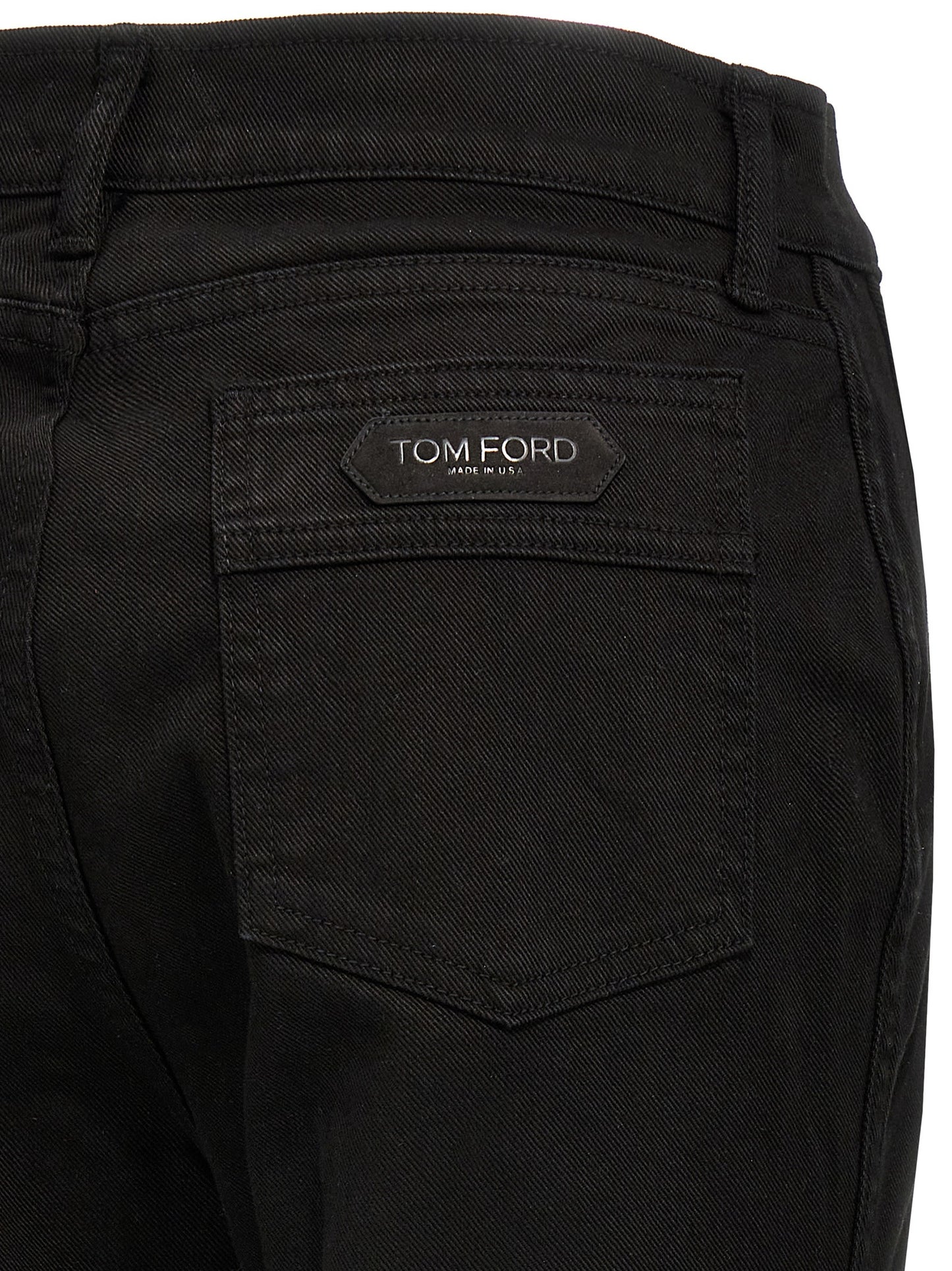Jeans by Tom Ford for women in stretch denim cotton twill & suede leather black & signature features an sophisticated and flared & wide with a precise long, creating a sophisticated and sophisticated silhouette.
