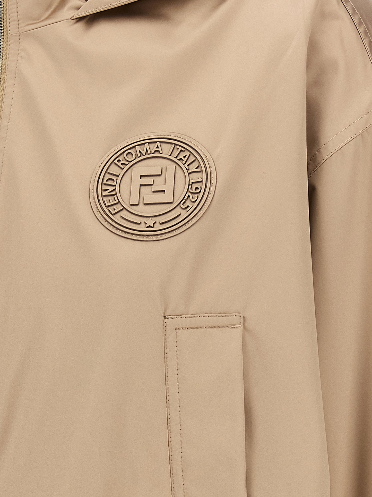 Hooded Windbreaker Jacket by Fendi for women in polyester & silk brown & jacquard showcases a urban chic silhouette, detailed with a urban chic and functional pockets, hooded & windproof for a polished finish.