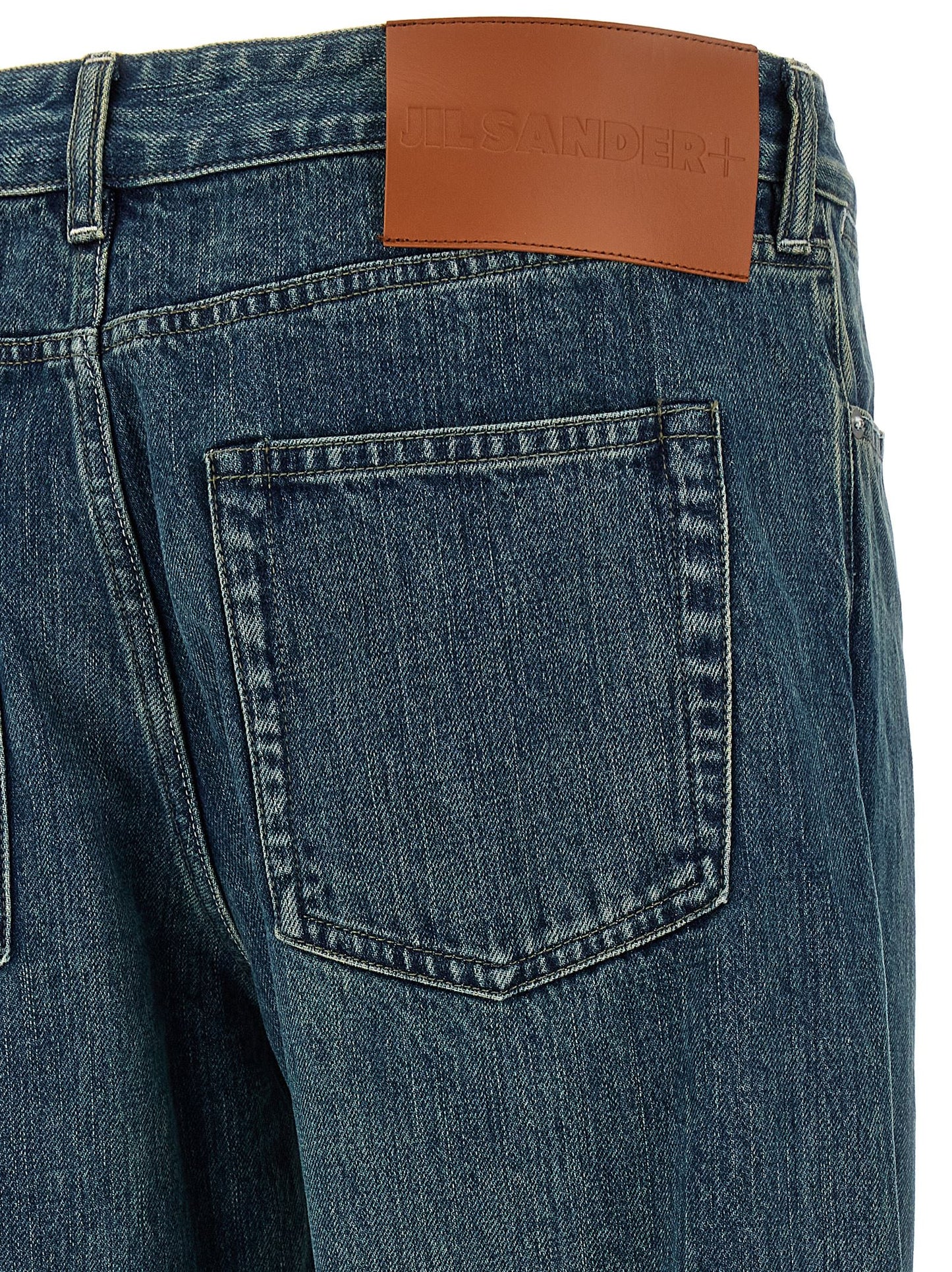 Jeans by Jil Sander for men in cotton denim blue & signature features an refined tailoring silhouette, showcasing a premium straight-leg with a and long cut for a refined tailoring look.