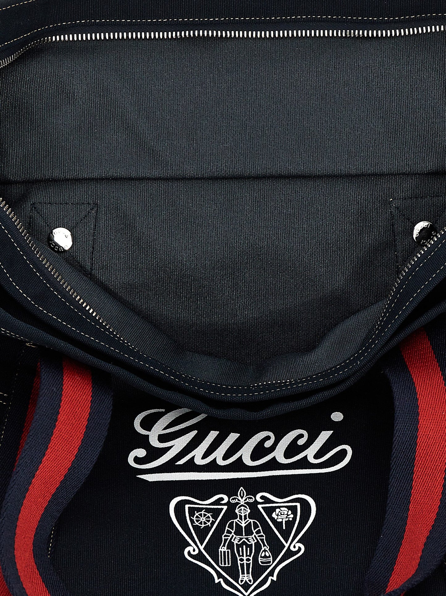 Large Shopper Tote Bag by Gucci for men in cotton & leather blue, signature & print features an metropolitan chic Cotton & Leather Large Shopper Tote Bag design with a secure zipper, metropolitan chic , and versatile handle for a metropolitan chic look.