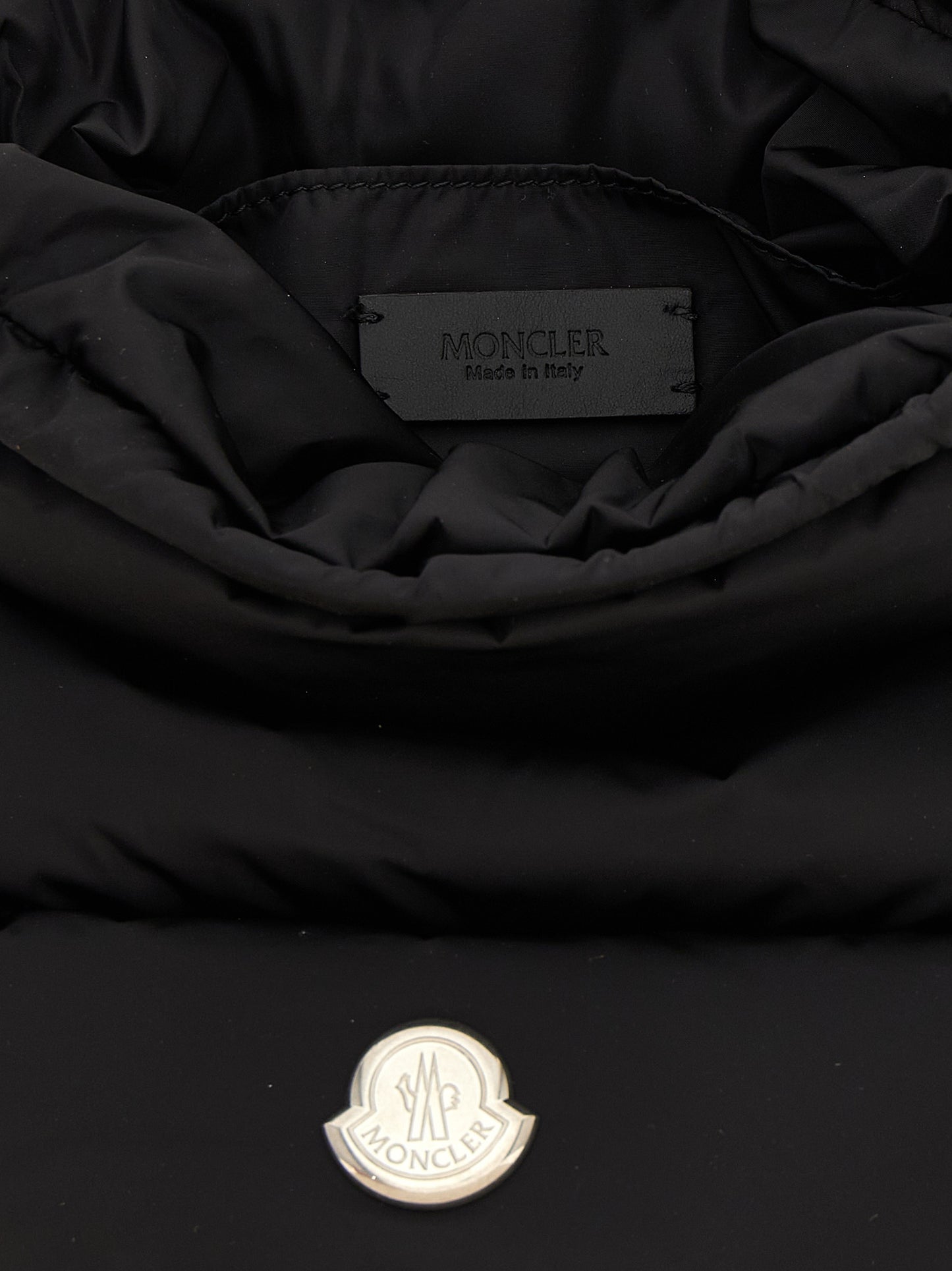 Mini Crossbody Bucket Handbag by Moncler for women in nylon polyamide leather black & silver features a contemporary silhouette, showcasing a secure drawstring, ample , and contemporary crossbody-strap, shoulder-strap, adjustable-strap, detachable-strap & handle for a sophisticated look.