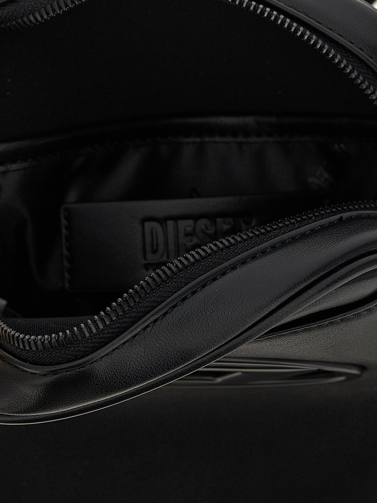 Crossbody Oval Handbag by Diesel for women in polyurethane leather black & signature features a versatile chic silhouette, meticulously detailed with a secure zipper, ample , and versatile crossbody-strap, shoulder-strap & adjustable-strap.