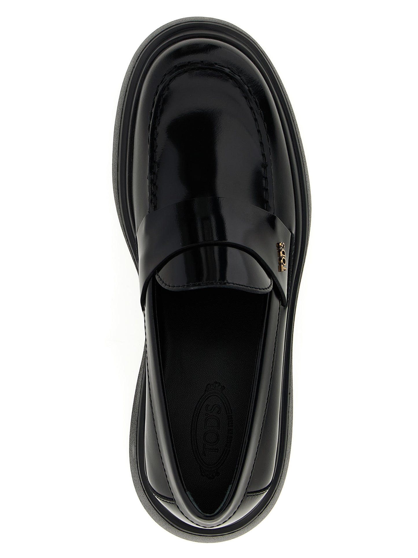 This Flat Loafer Slip-On Shoes by Tod's for women in calfskin leather black features an exquisite silhouette from the Women's Calfskin Leather Flat Loafer Slip-On Shoes collection, defined by a sophisticated flat and elegant .