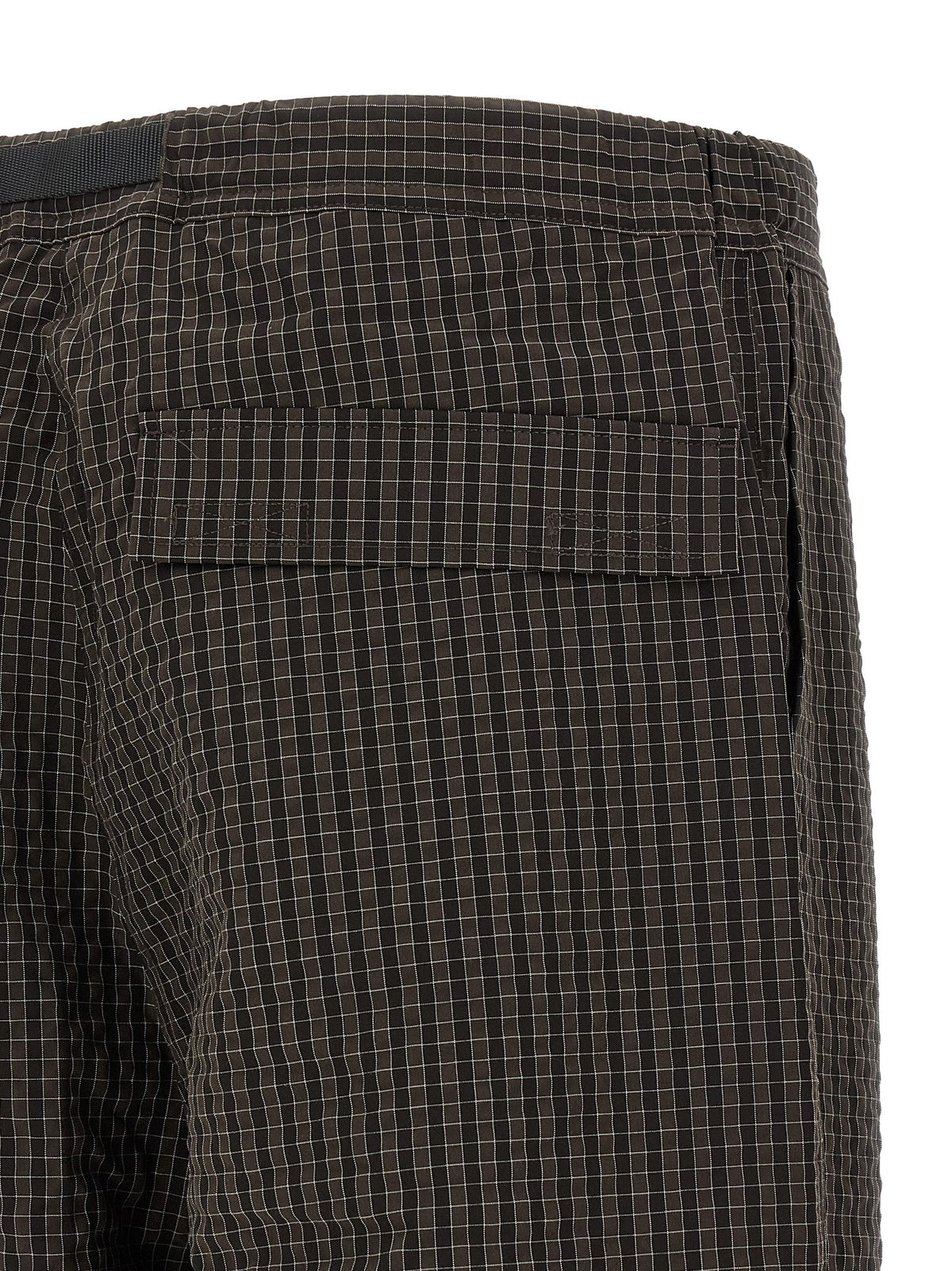 Casual Pants by Gramicci for men in polyester & rayon brown, patterned, checked & plaid features an sophisticated and wide with a precise long, creating a sophisticated and sophisticated silhouette.