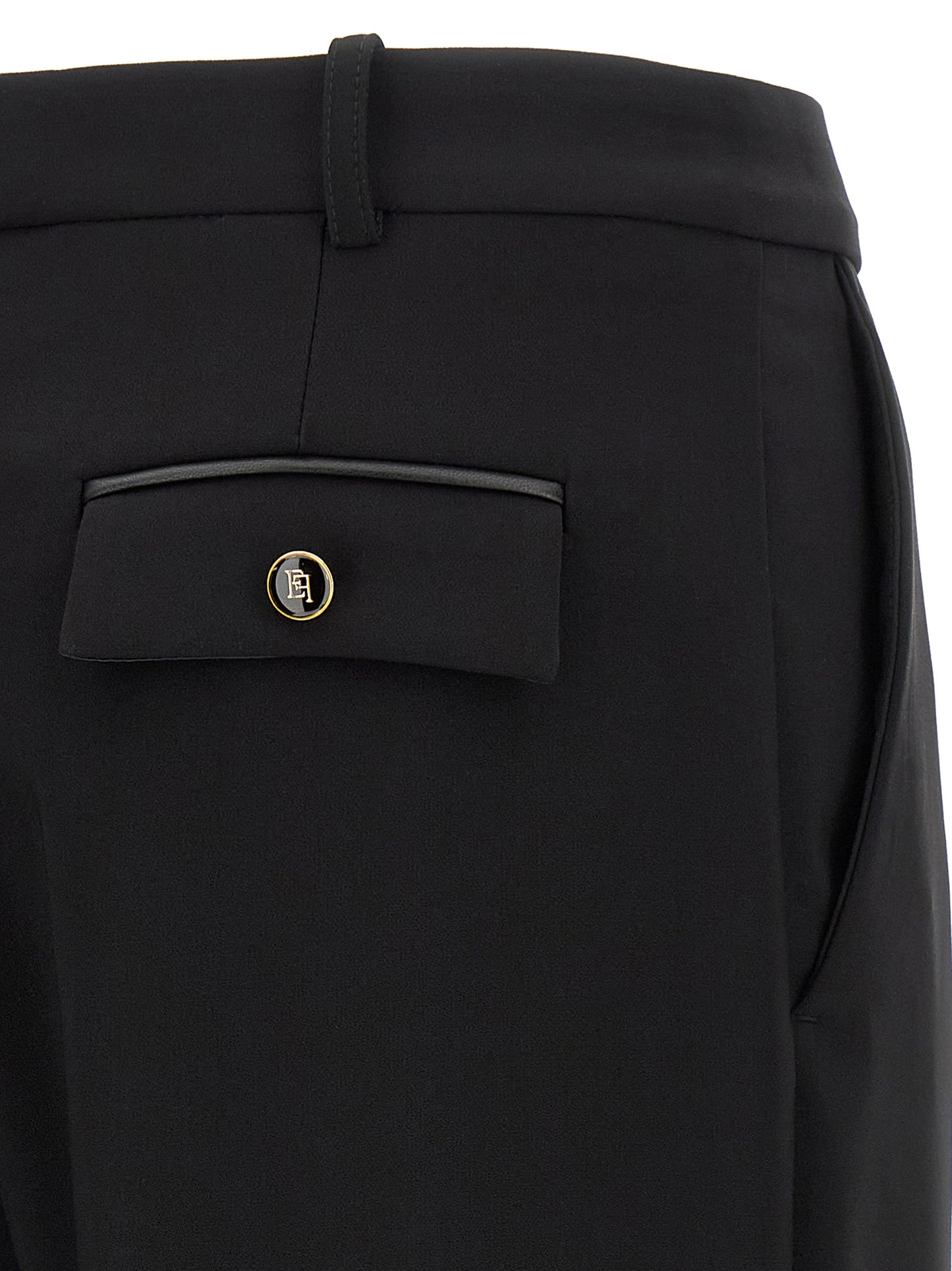 Casual Pants by Elisabetta Franchi for women in stretch polyester black features a polished silhouette with a polished straight-leg & wide, reaching a polished long and finished with a polished .