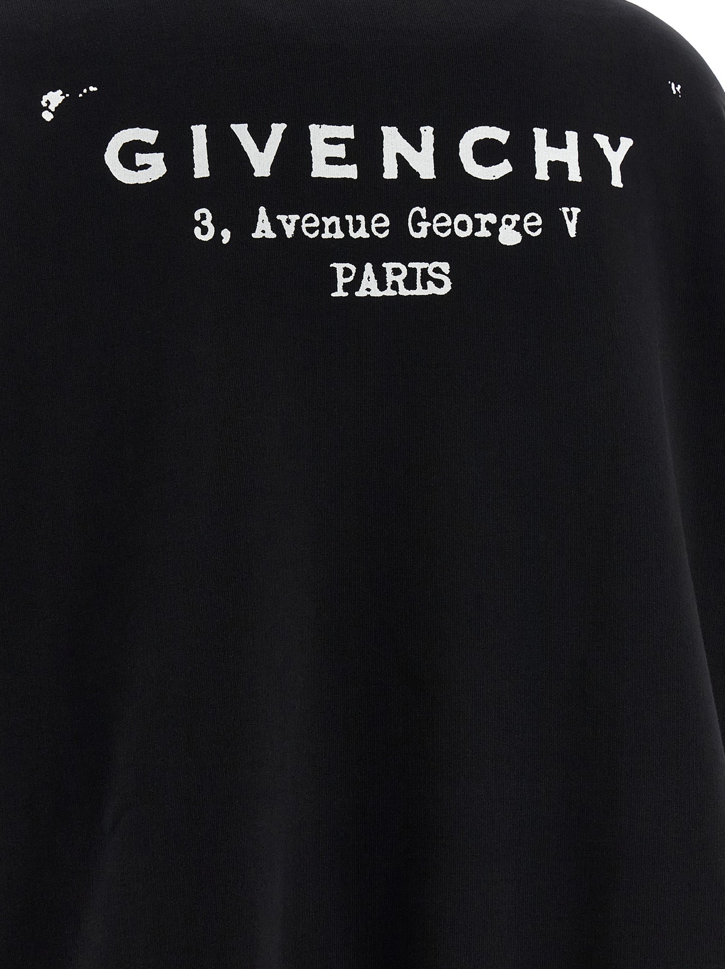 Sweatshirt Hoodie by Givenchy for women in cotton bicolour, black, white & print features an dramatic silhouette, showcasing a sophisticated and dramatic for a refined, modern aesthetic.