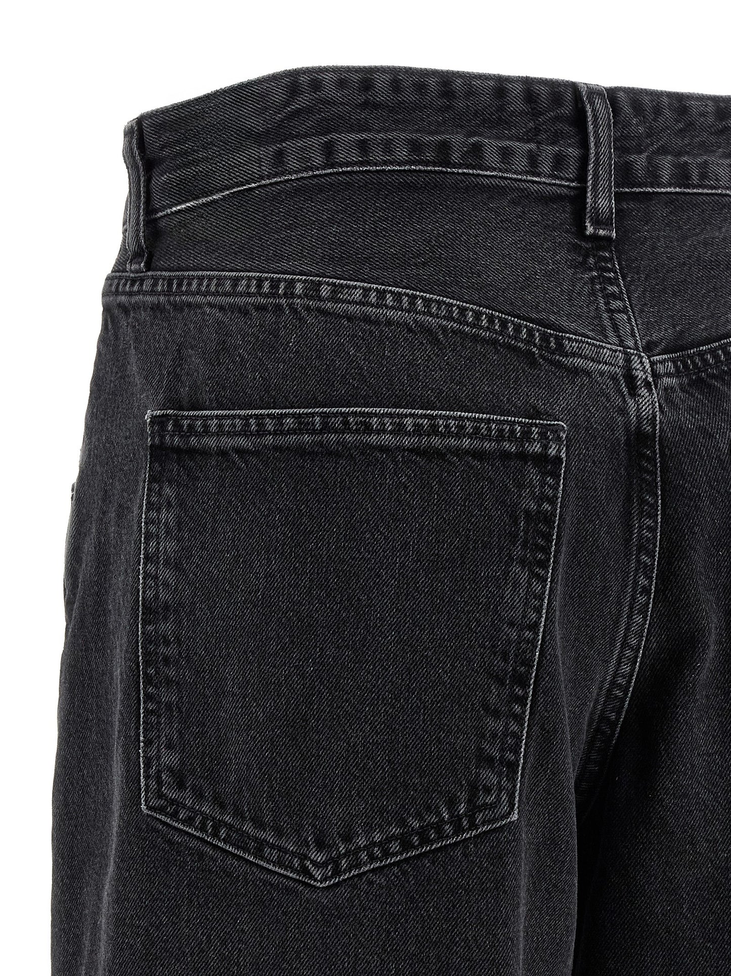 Jeans by Agolde for women in denim cotton black presents a refined pantology silhouette, artfully defined by a refined pantology relaxed-fit & wide, long, and a sophisticated .