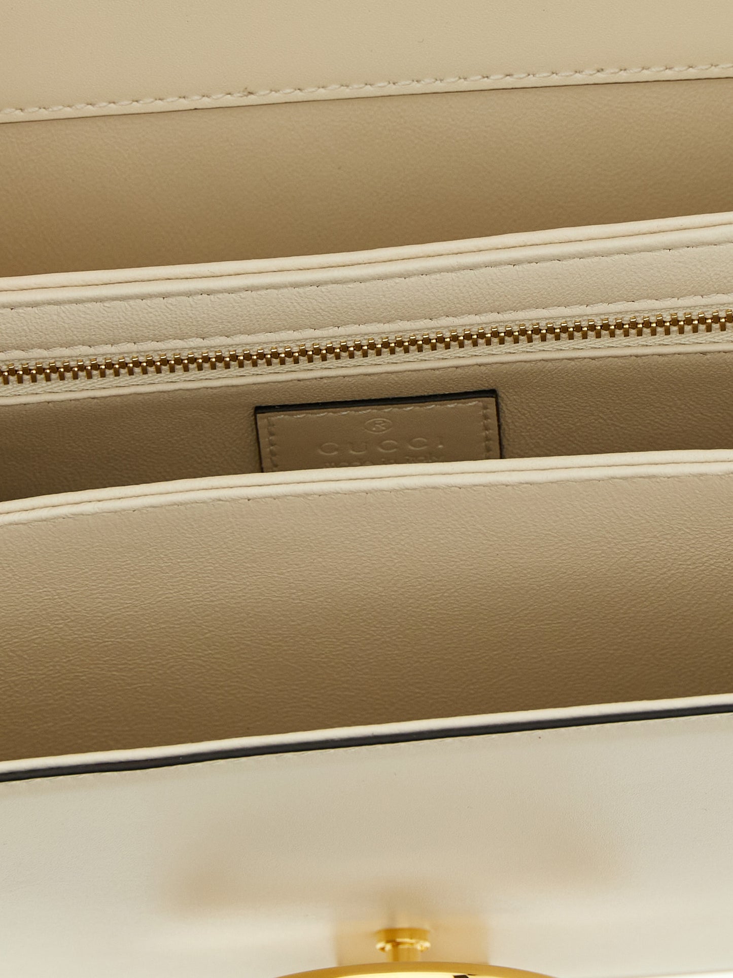 2-in-1 Shoulder & Crossbody Flap Bag by Gucci for women in calfskin leather white features an effortlessly chic silhouette with a secure flap, ample , and versatile crossbody-strap, shoulder-strap & adjustable-strap for effortlessly chic everyday luxury.