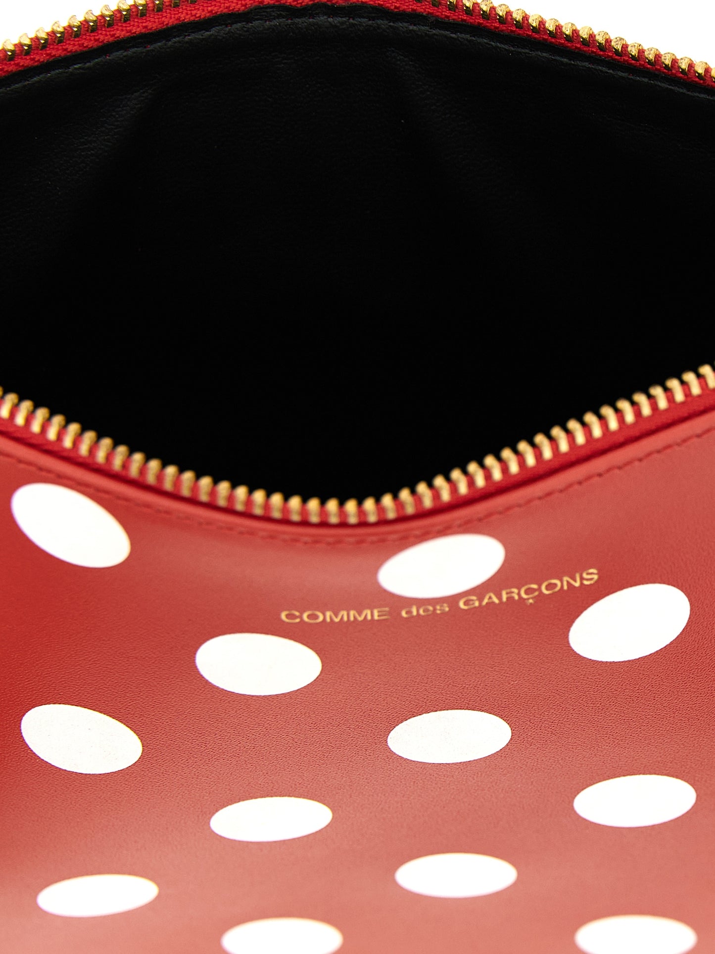 Wallet by Comme Des Garçons for men in calfskin leather multicolor, red & print presents a streamlined silhouette, showcasing the sophisticated design of the Calfskin Leather Wallet collection with functional .