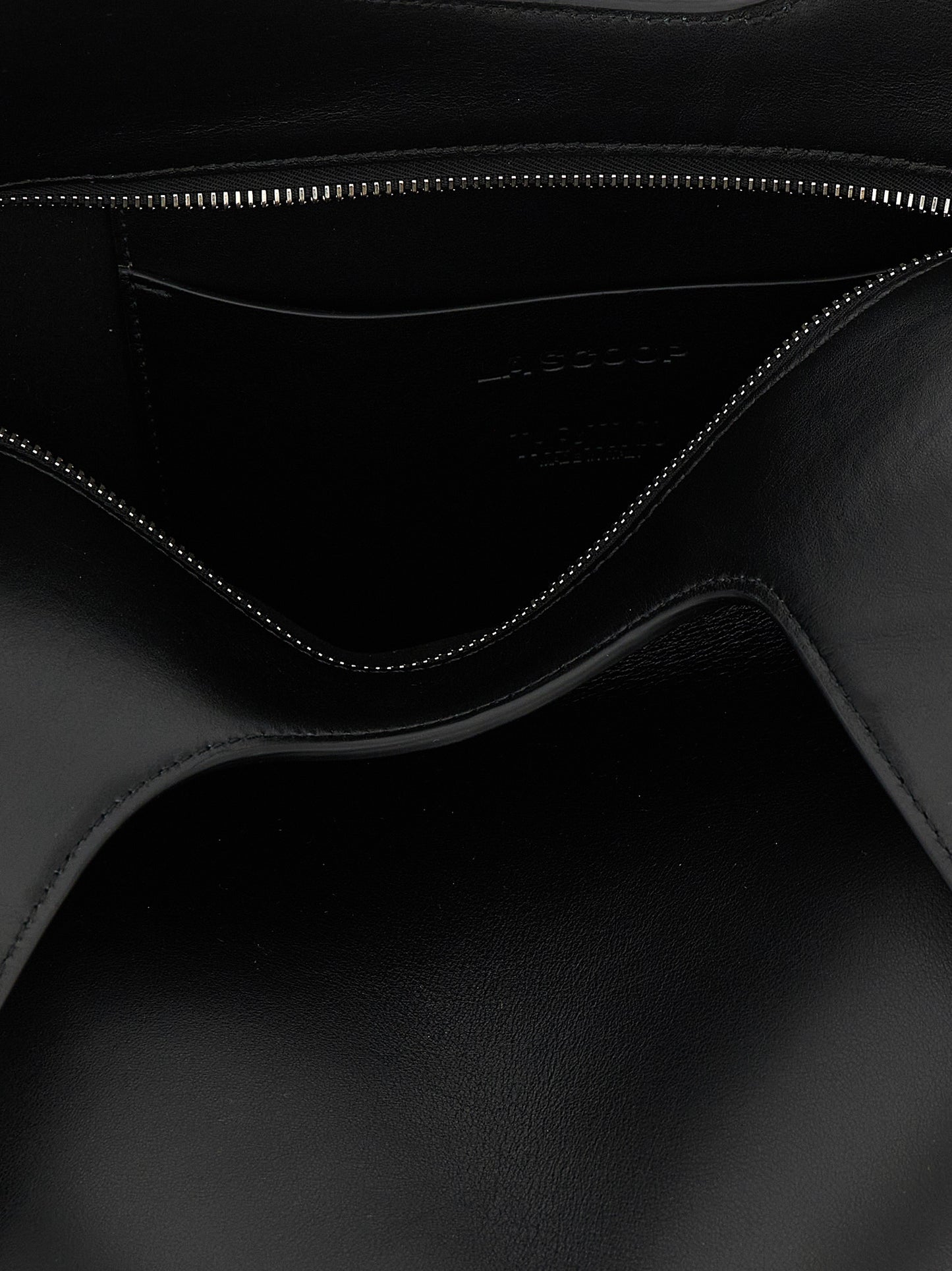 Medium Shoulder Bag by The Attico for women in calfskin leather black presents a statuesque silhouette, showcasing a secure zipper and statuesque with versatile shoulder-strap & handle for a sophisticated look.