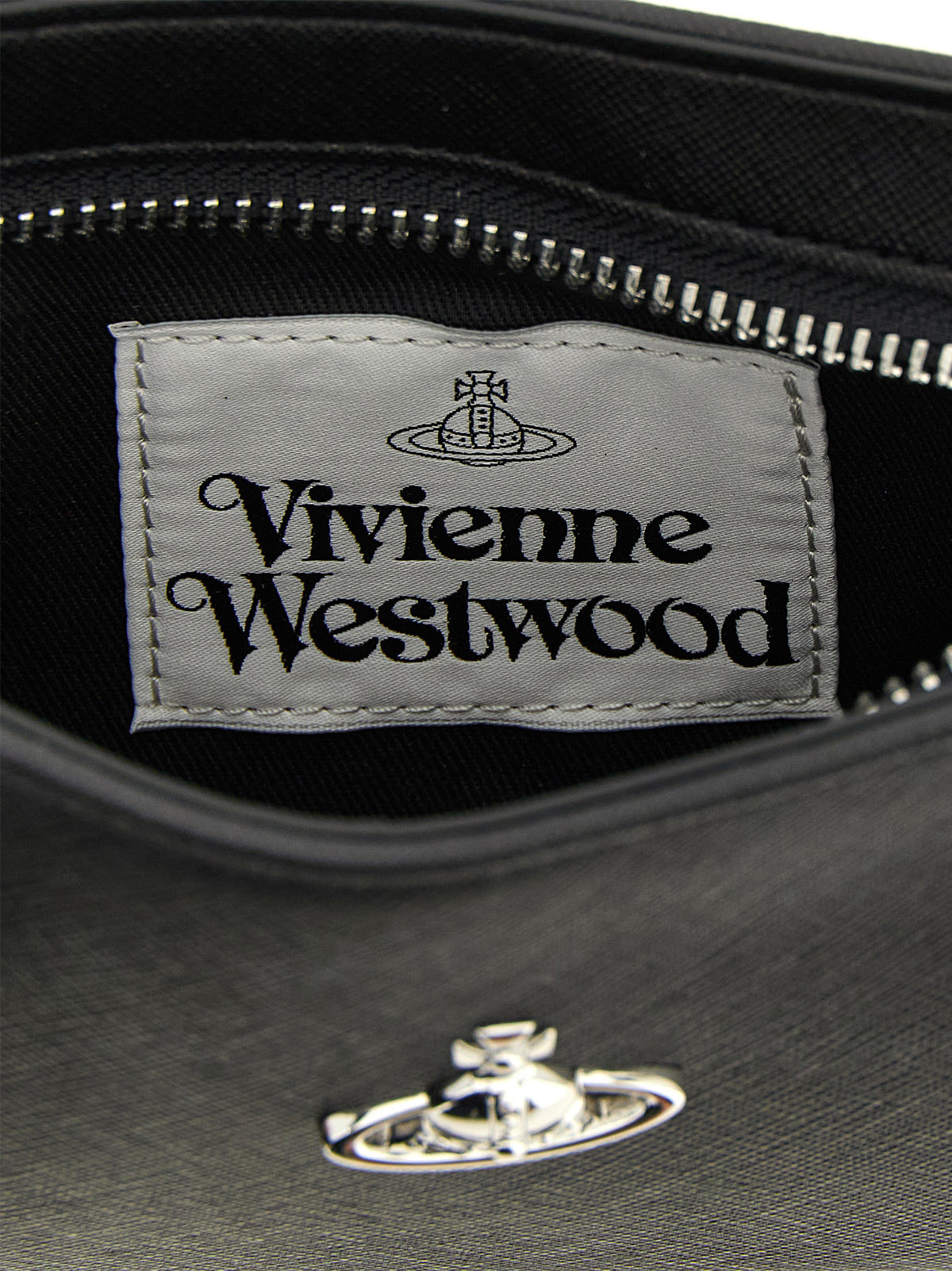 Shoulder Bag by Vivienne Westwood for women in polyethylene polyurethane & cotton black features a effortless sophistication silhouette, secured by a zipper with ample and versatile shoulder-strap, adjustable-strap & handle for a effortless sophistication finish.