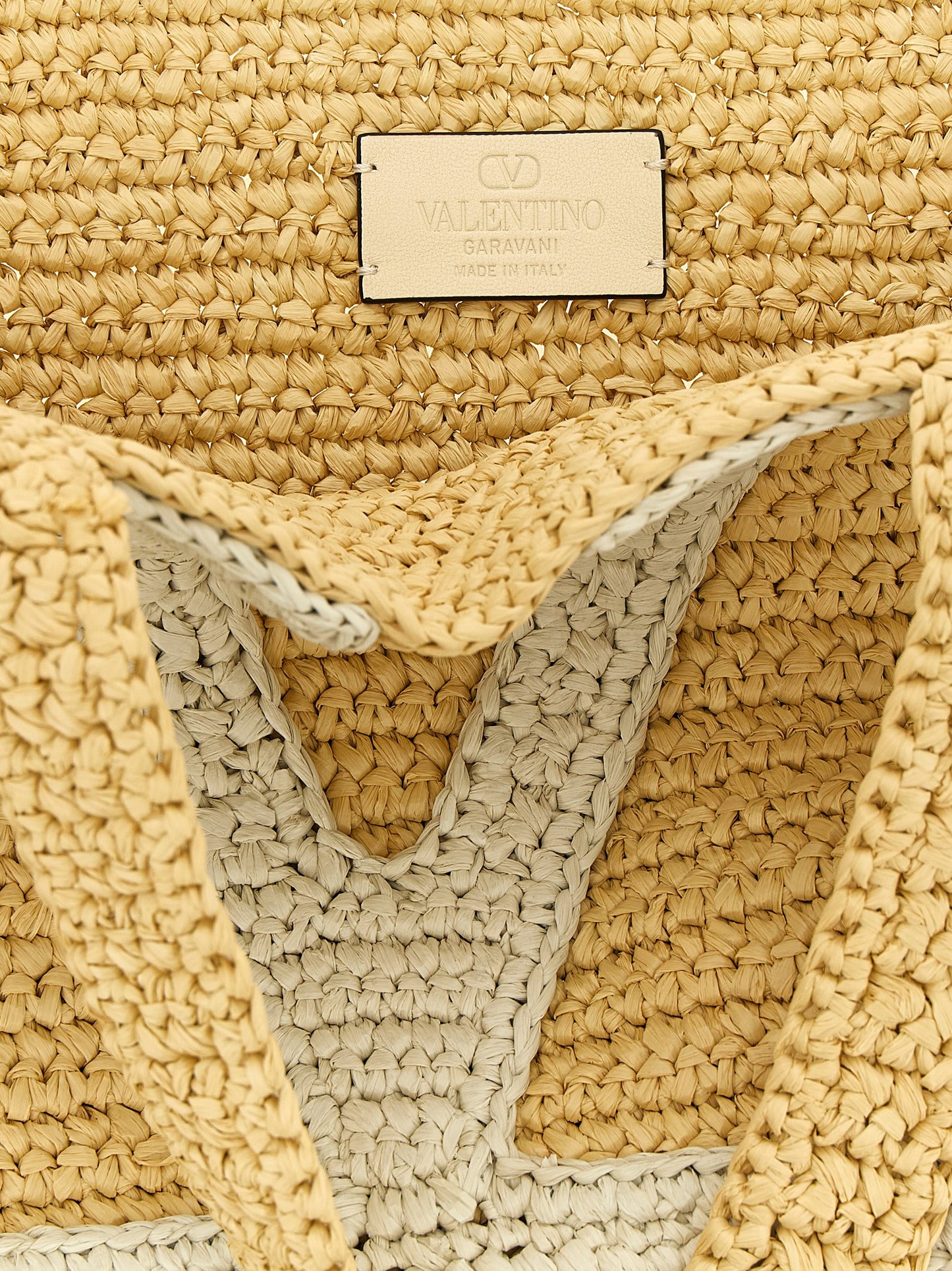 Medium Shopper Tote Bag by Valentino Garavani for women in raffia polyester polyurethane python leather white & signature features a distinguished Crochet Icon Viva Superstar V Logo Raffia Polyester Polyurethane Python Leather Medium Shopper Tote Bag design, complete with a secure , ample , and versatile handle for a distinguished look.