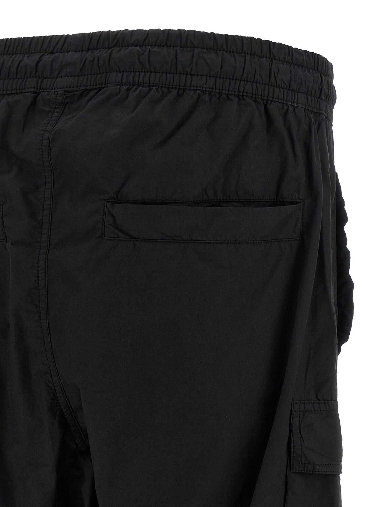 Cargo Pants by Thom Krom for men in organic cotton black presents a on trend silhouette, artfully finished with a on trend relaxed-fit, long, and for a sophisticated look.