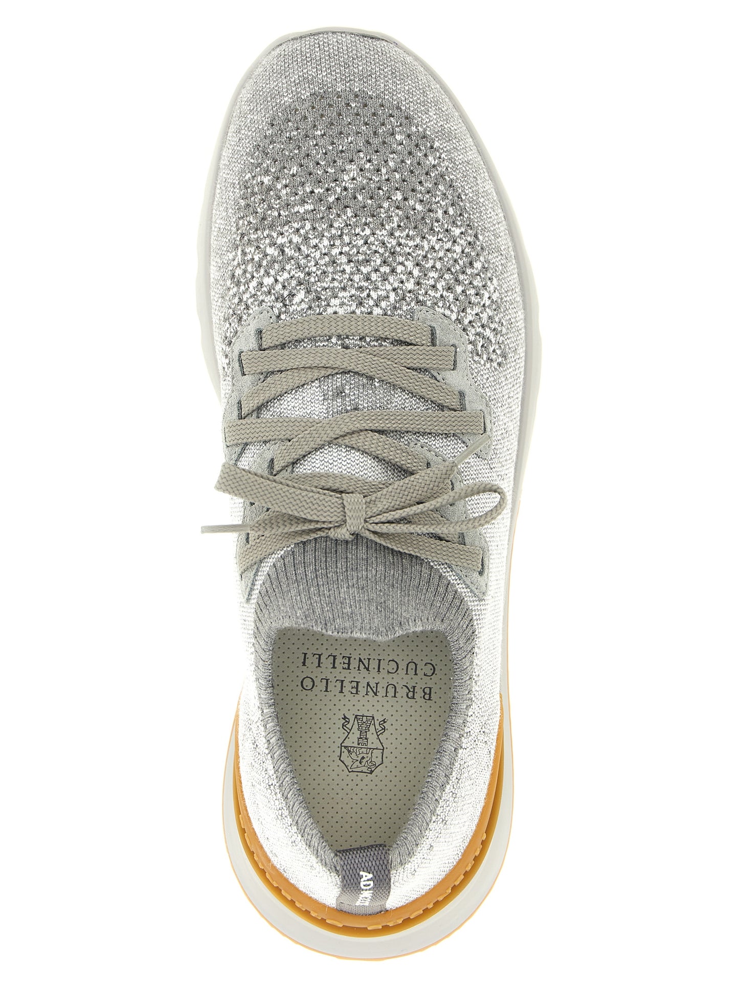 Athletic Sneakers by Brunello Cucinelli for men in stretch polyamide cotton gray showcases a architectural silhouette, artfully capturing the essence of the Men's Slip On Stretch Polyamide Cotton Athletic Sneakers with its signature architectural slip-on style construction.