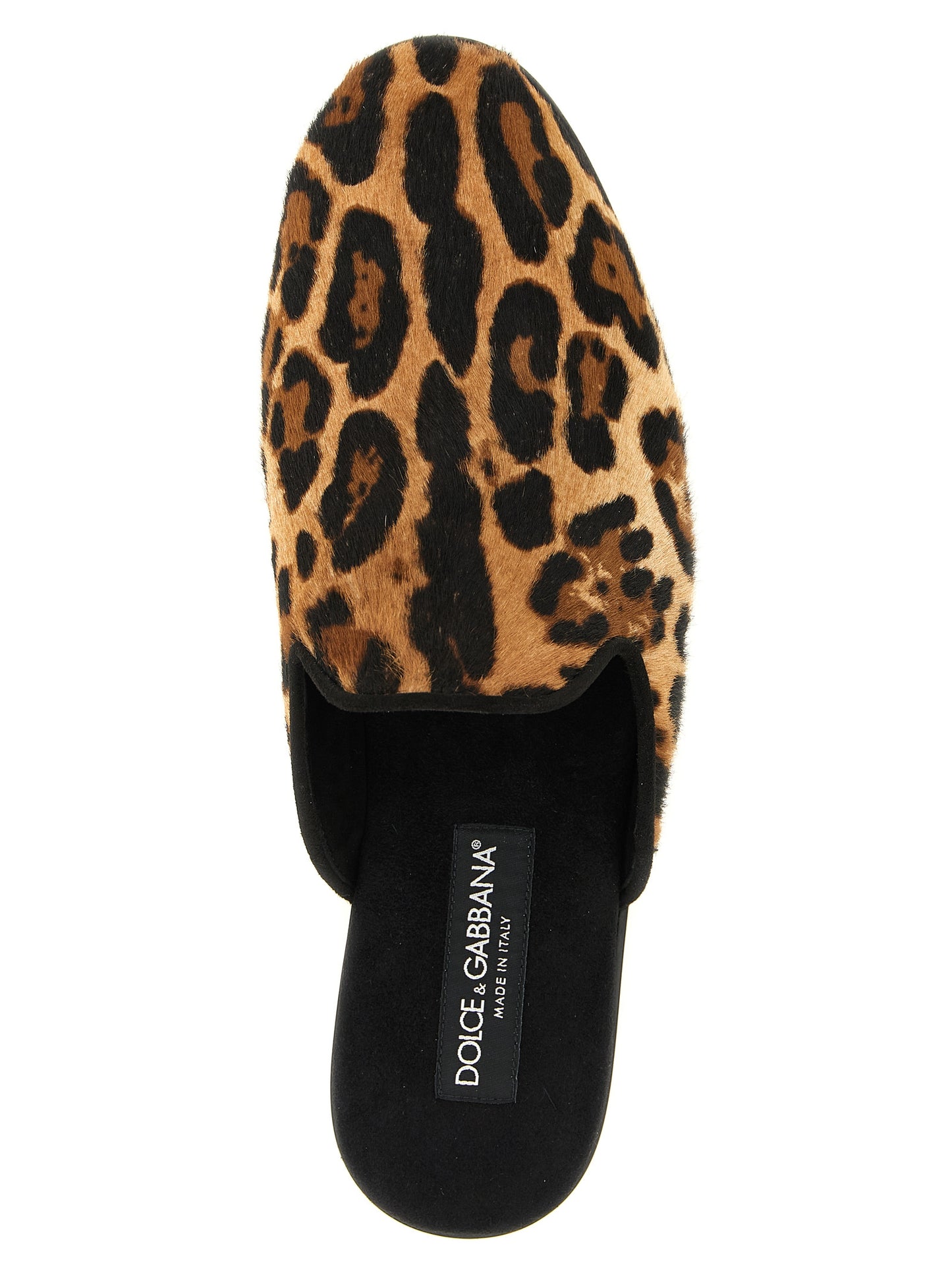 Flat Slippers Shoes by Dolce & Gabbana for men in tu goat & calfskin leather brown & print showcases a impeccable silhouette as Pony Men's TU Goat & Calfskin Leather Flat Slippers Shoes, artfully designed with a impeccable flat and refined for a impeccable finish.