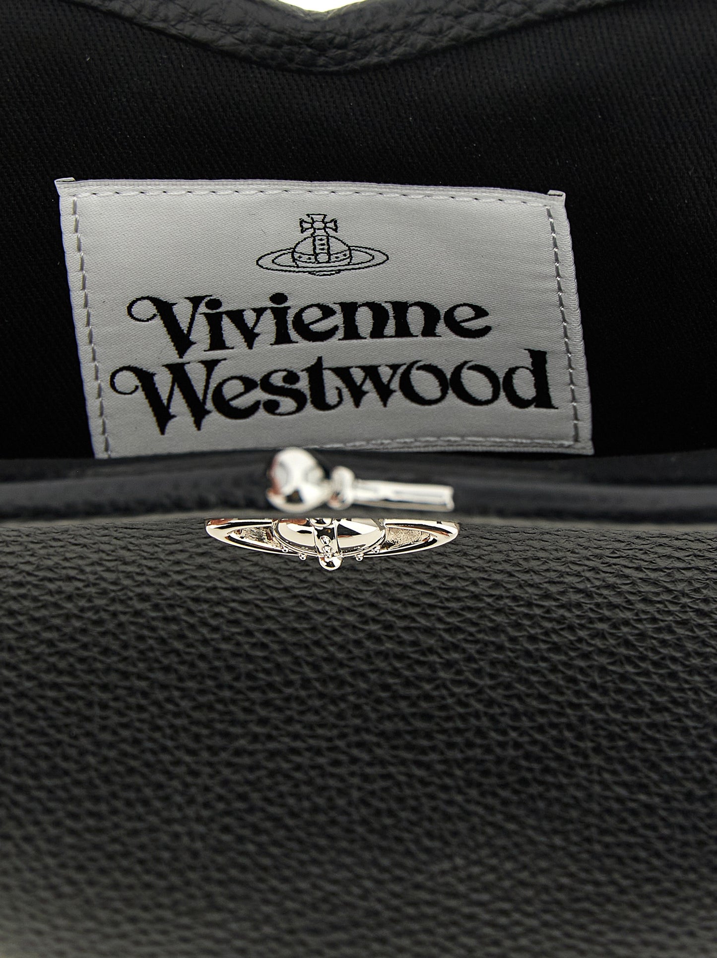 Frame Handbag by Vivienne Westwood for women in polyurethane leather black & signature features a signature silhouette, showcasing a secure snap and signature with versatile shoulder-strap & handle for a sophisticated look.