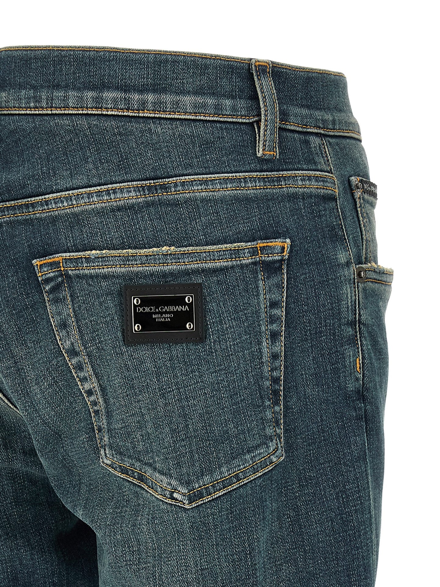 Jeans by Dolce & Gabbana for men in stretch denim cotton blue features an sophisticated low rise and slim with a precise long, creating a sophisticated and sophisticated silhouette.
