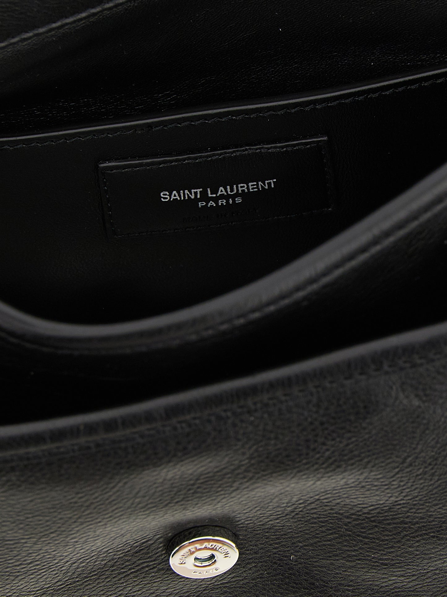 Small Crossbody Messenger Bag by Saint Laurent for men in calfskin leather black showcases a stylish Cassandre Essence Niki Calfskin Leather Small Crossbody Messenger Bag design, featuring a secure flap & magnetic and ample with versatile crossbody-strap, shoulder-strap & adjustable-strap for a stylish look.