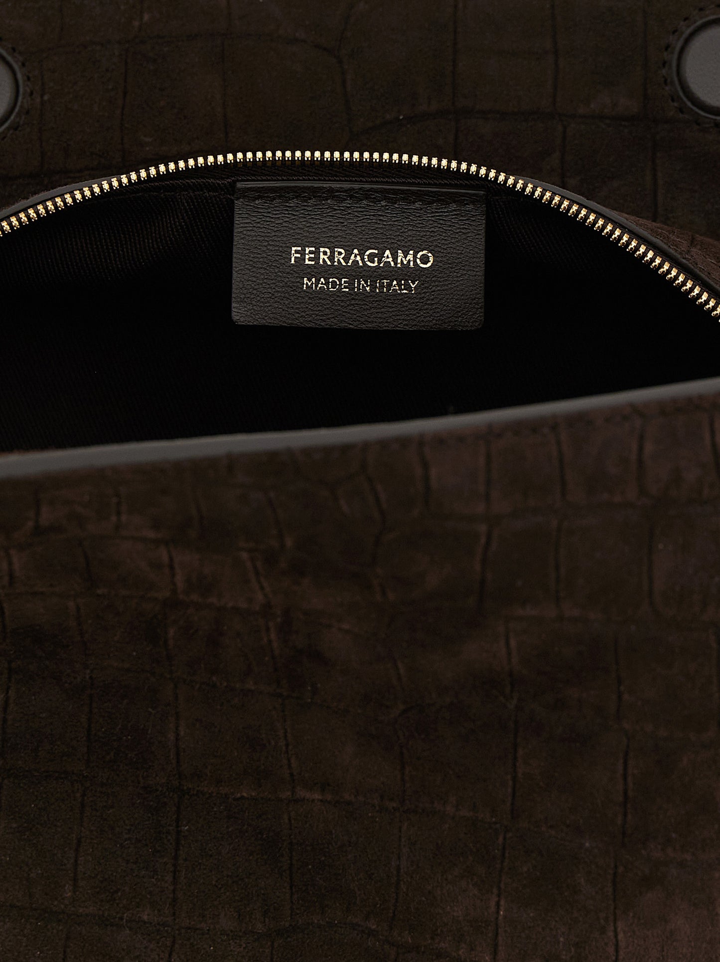 Shoulder Bag by Ferragamo for women in suede exotic leather brown features a enviable silhouette, showcasing a secure zipper & magnetic, ample , and enviable shoulder-strap & handle for a enviable finish.