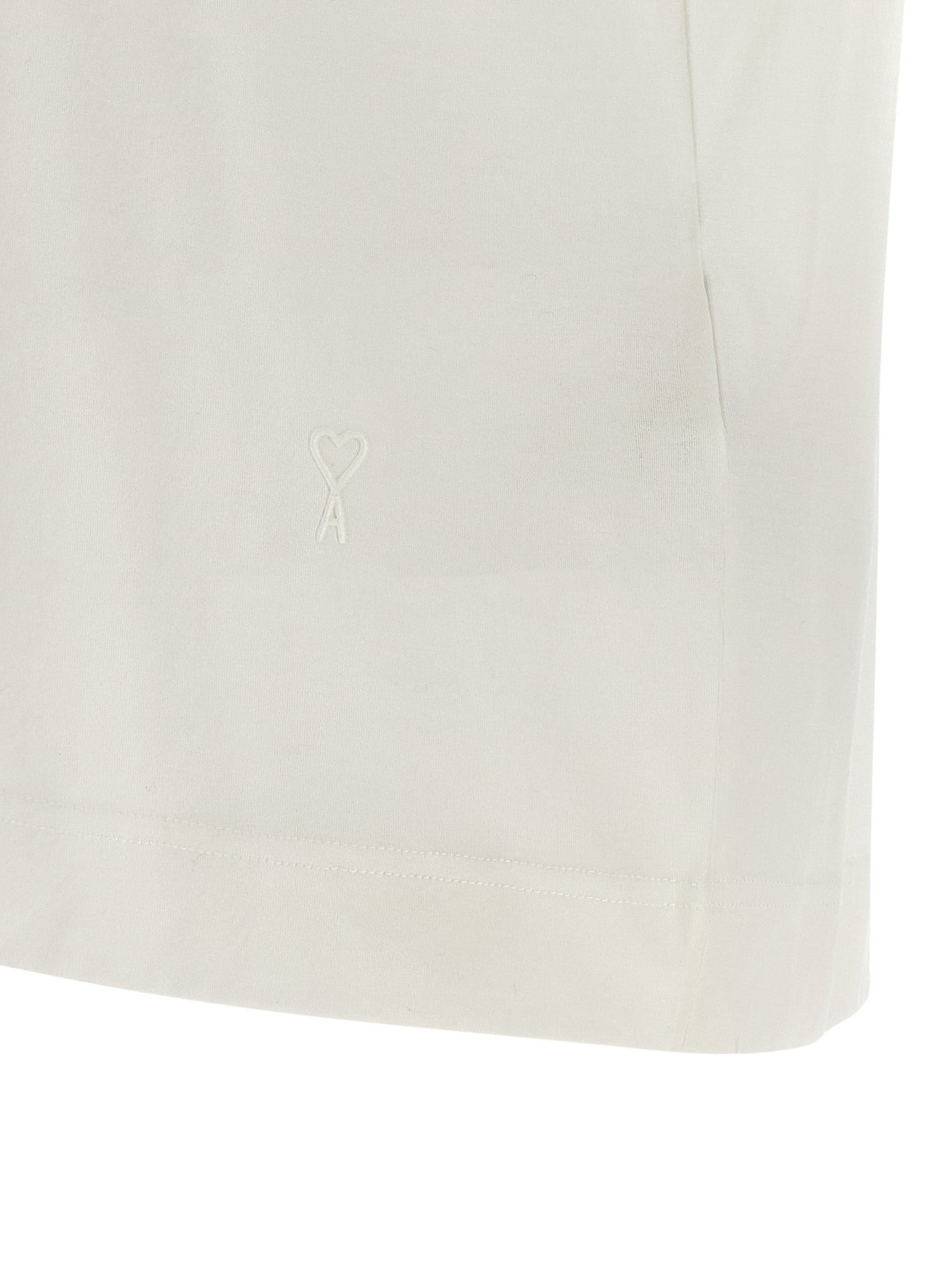 T-Shirt by Ami Paris for women in cotton transparent & white showcases a fashionable silhouette, elegantly detailed with a fashionable and for a sophisticated, high-fashion look.