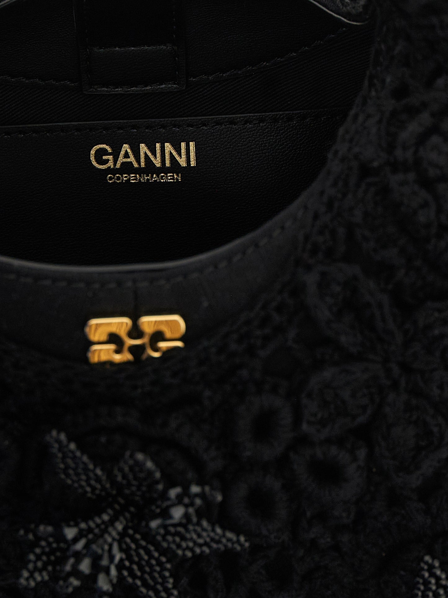 Mini Hobo Handbag by Ganni for women in organic cotton & leather black & floral features a exquisite silhouette, showcasing a secure magnetic and exquisite with versatile shoulder-strap & adjustable-strap for a exquisite finish.