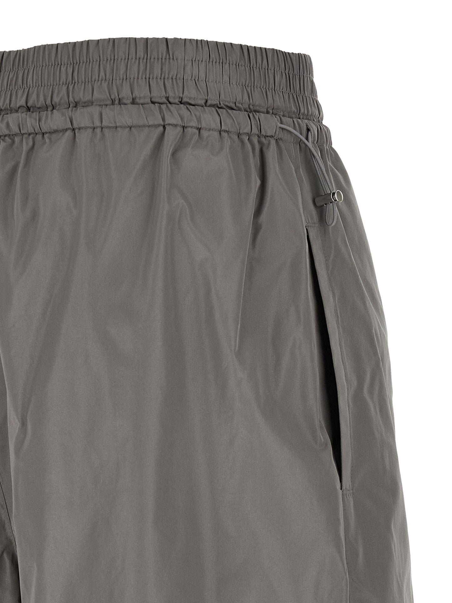 Joggers by Alexander Wang for women in polyester gray presents a refined pantology silhouette, artfully defined by a refined pantology athletic & wide, long, and a sophisticated .
