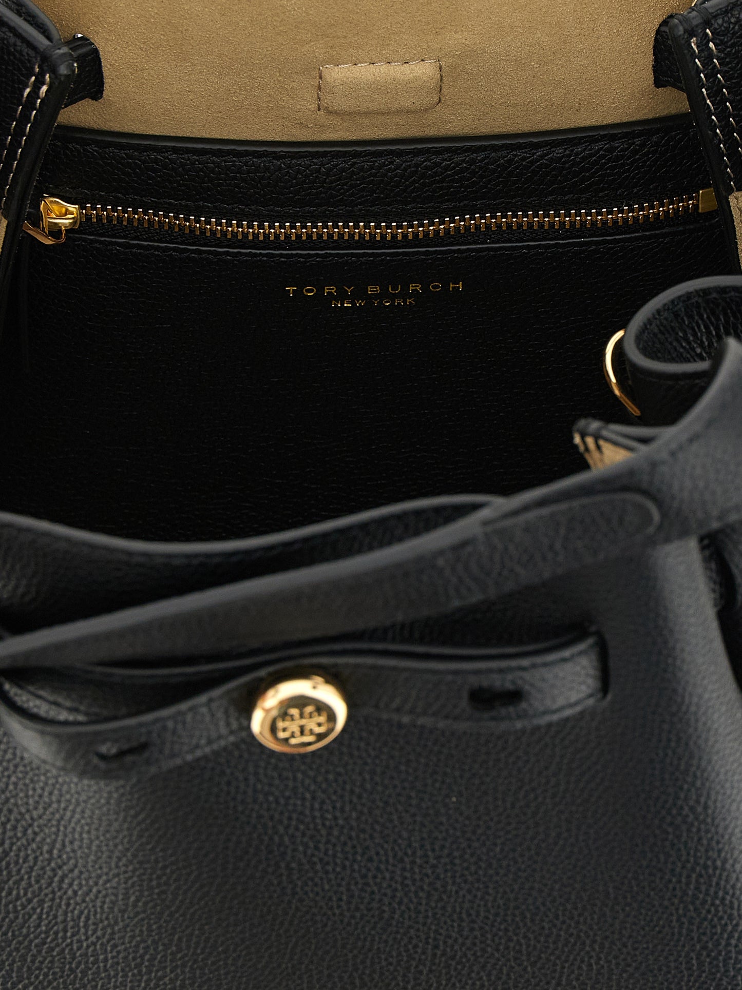 Small Handbag by Tory Burch for women in bos taurus suede calf leather black & signature features a signature silhouette, showcasing a secure magnetic and signature with versatile shoulder-strap, handle, adjustable-strap & belt-strap for a sophisticated look.