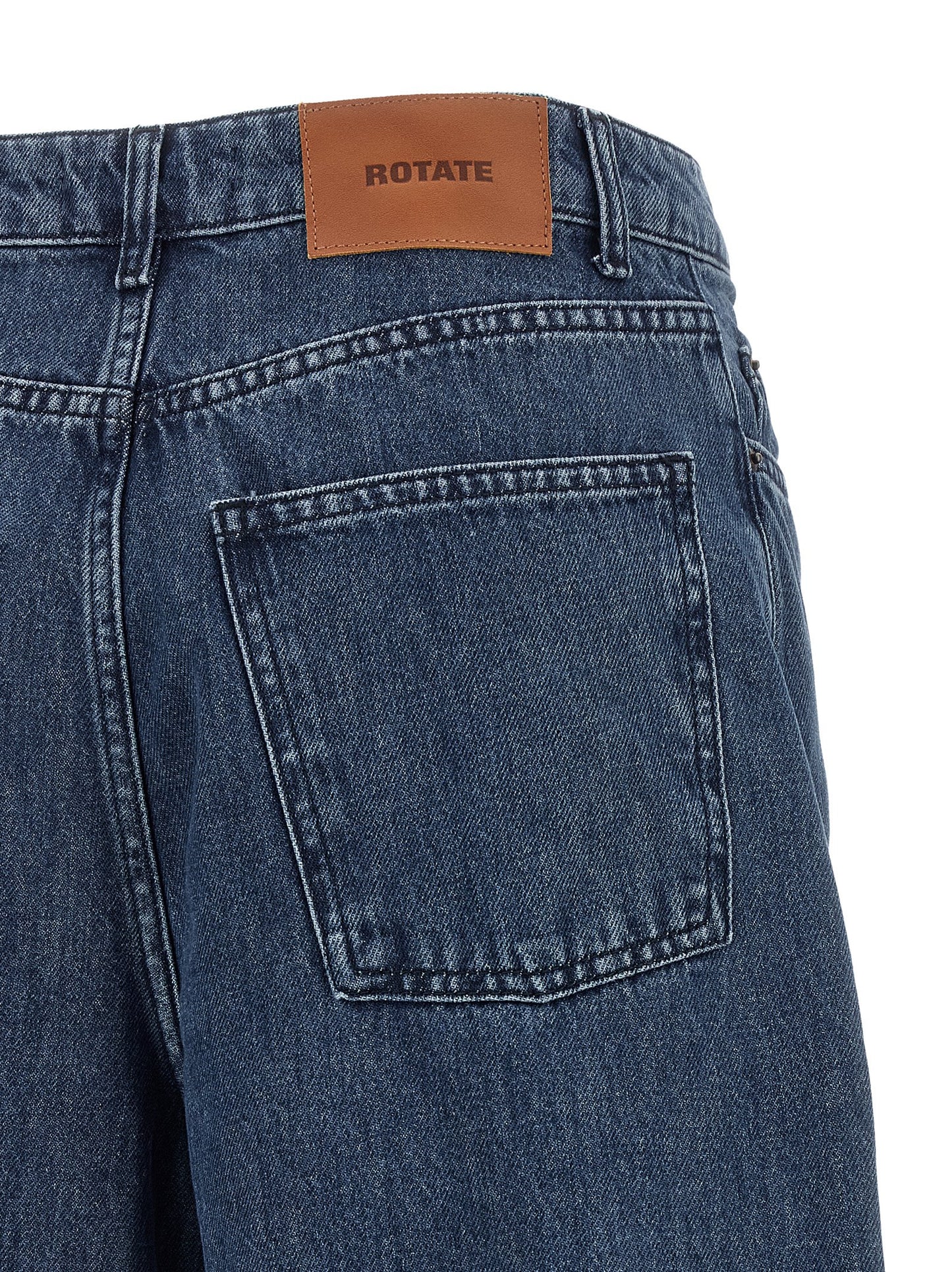 Jeans by ROTATE BIRGER CHRISTENSEN for women in organic denim cotton & leather blue presents a refined pantology silhouette, artfully defined by a refined pantology relaxed-fit, long, and a sophisticated high rise.