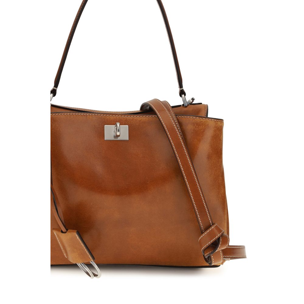 Handbag by Balenciaga for women in lambskin leather brown & silver features a exquisite silhouette, showcasing a secure and exquisite built-in-compartments & external-pockets with versatile shoulder-strap & handle for a exquisite finish.