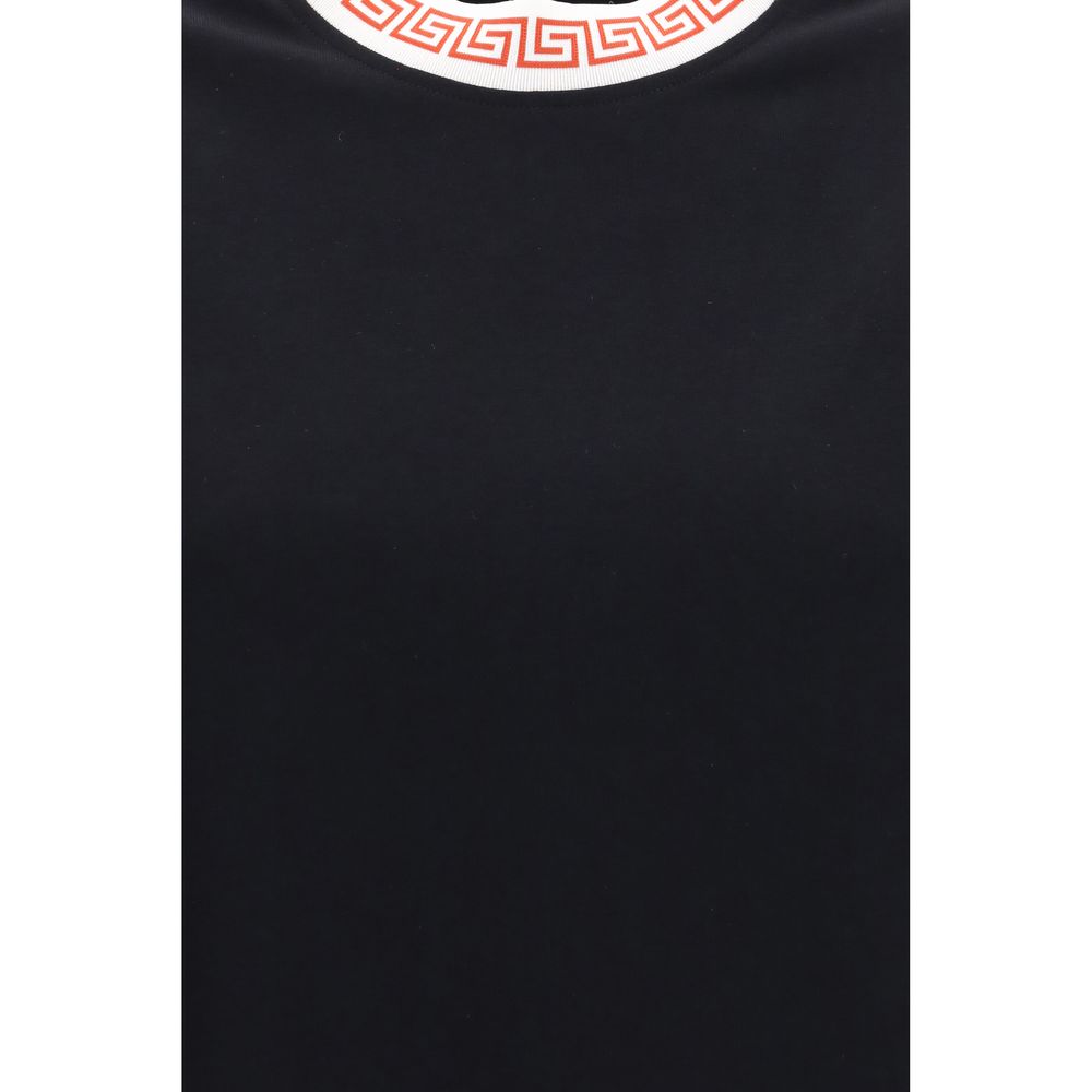 T-Shirt by Versace for women in cotton black showcases a fashionable silhouette, elegantly detailed with a fashionable and for a sophisticated, high-fashion look.