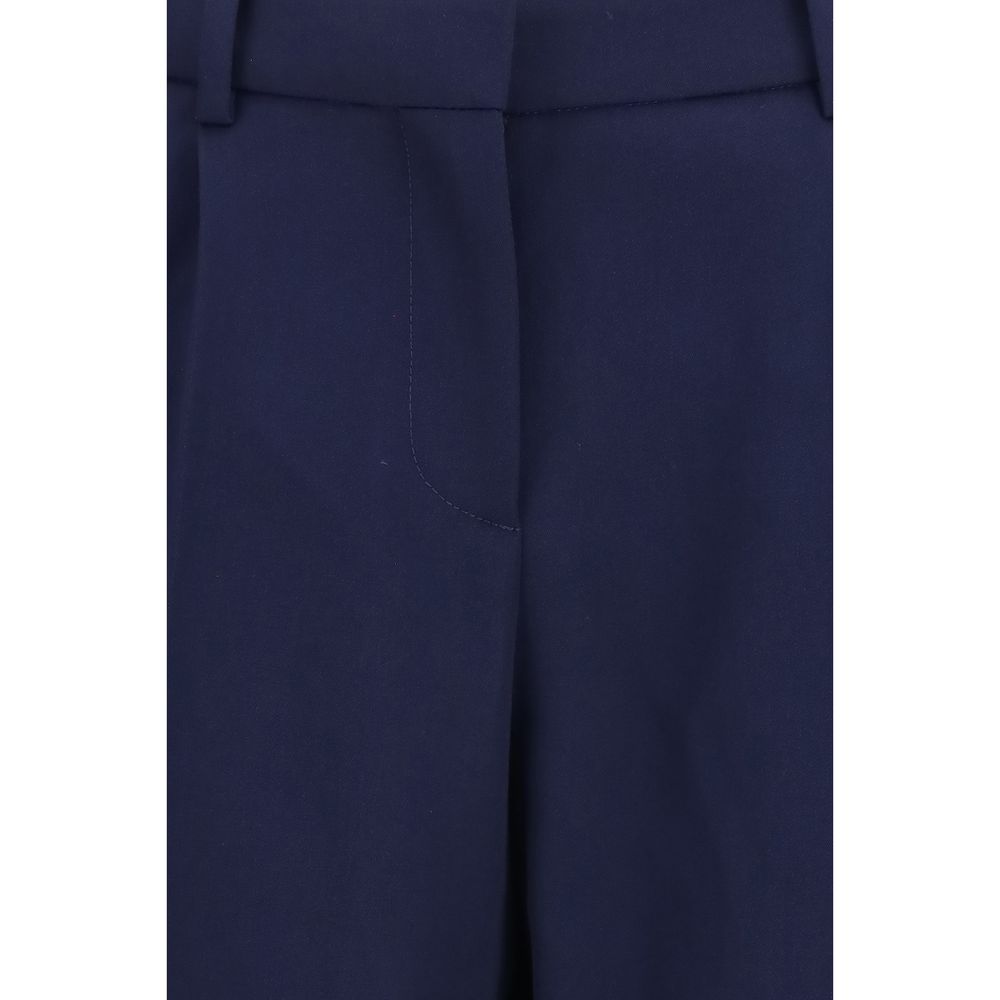 Pants by Balenciaga for women in merino wool twill blue showcases a unrivaled comfort silhouette, featuring a regular-fit & slim cut and long with a for a unrivaled comfort and refined aesthetic.