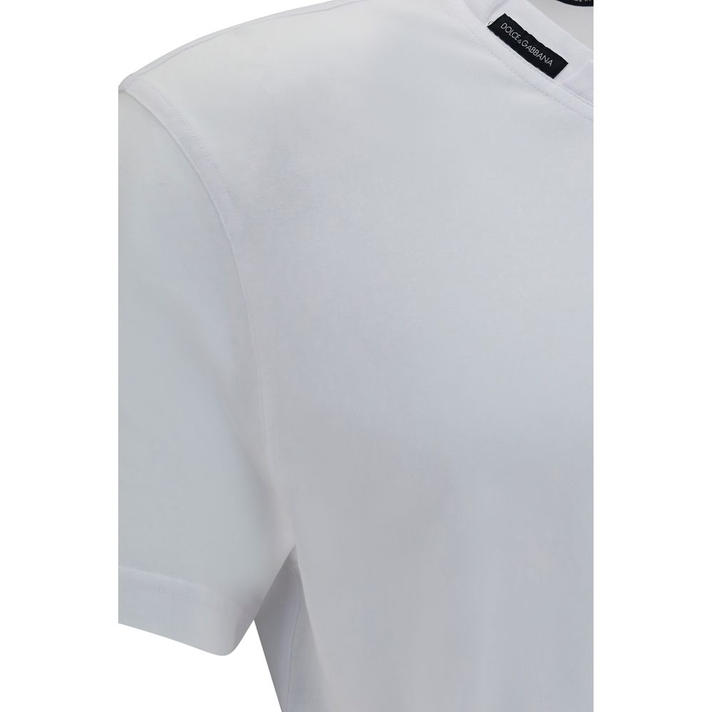 T-Shirt by Dolce & Gabbana for men in cotton white showcases a dramatic silhouette, elegantly detailed with a dramatic and for a truly dramatic finish.