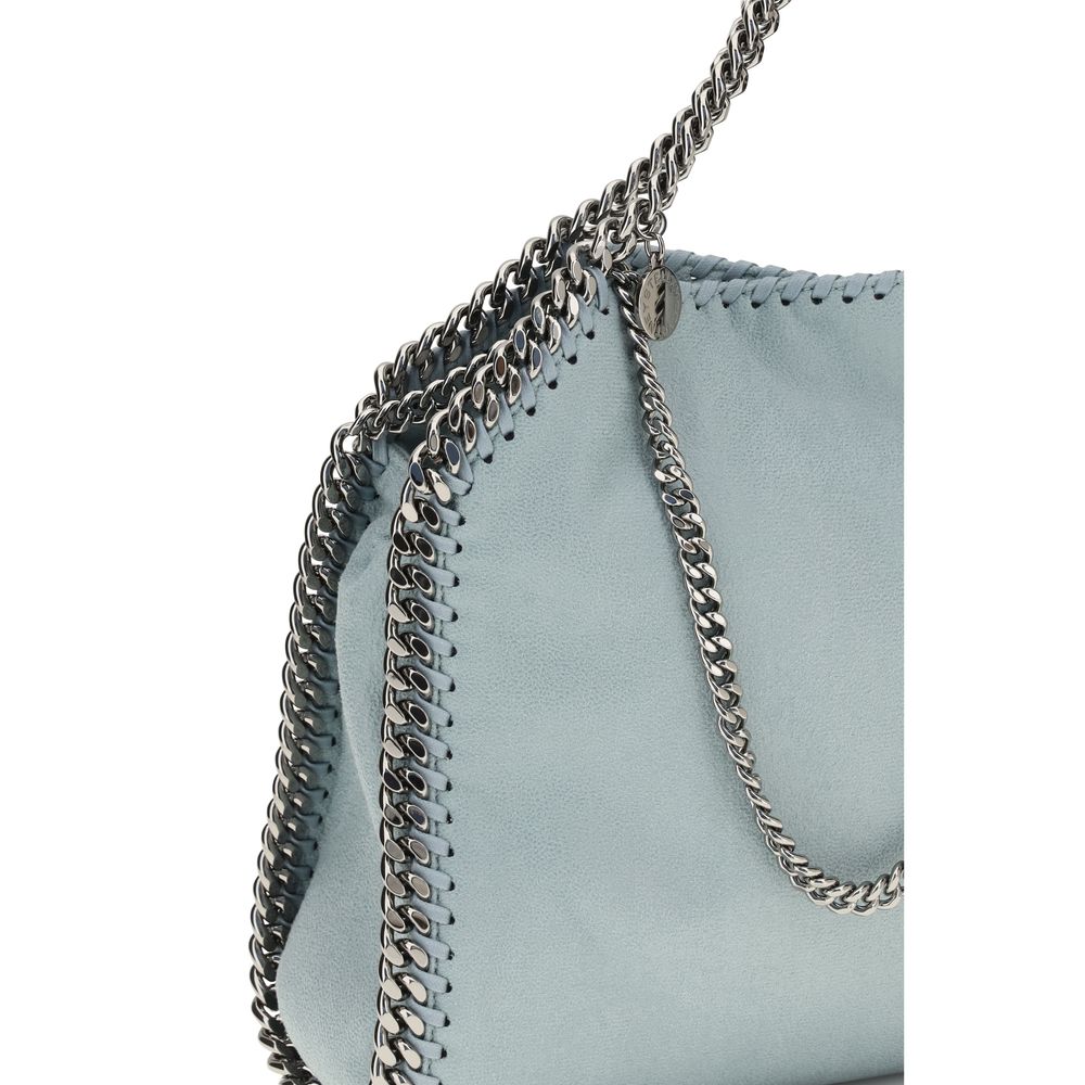 Mini Flap Handbag by Stella McCartney for women in polyester blue & silver features a signature silhouette, showcasing a secure flap & magnetic and signature with versatile shoulder-strap & handle for a sophisticated look.
