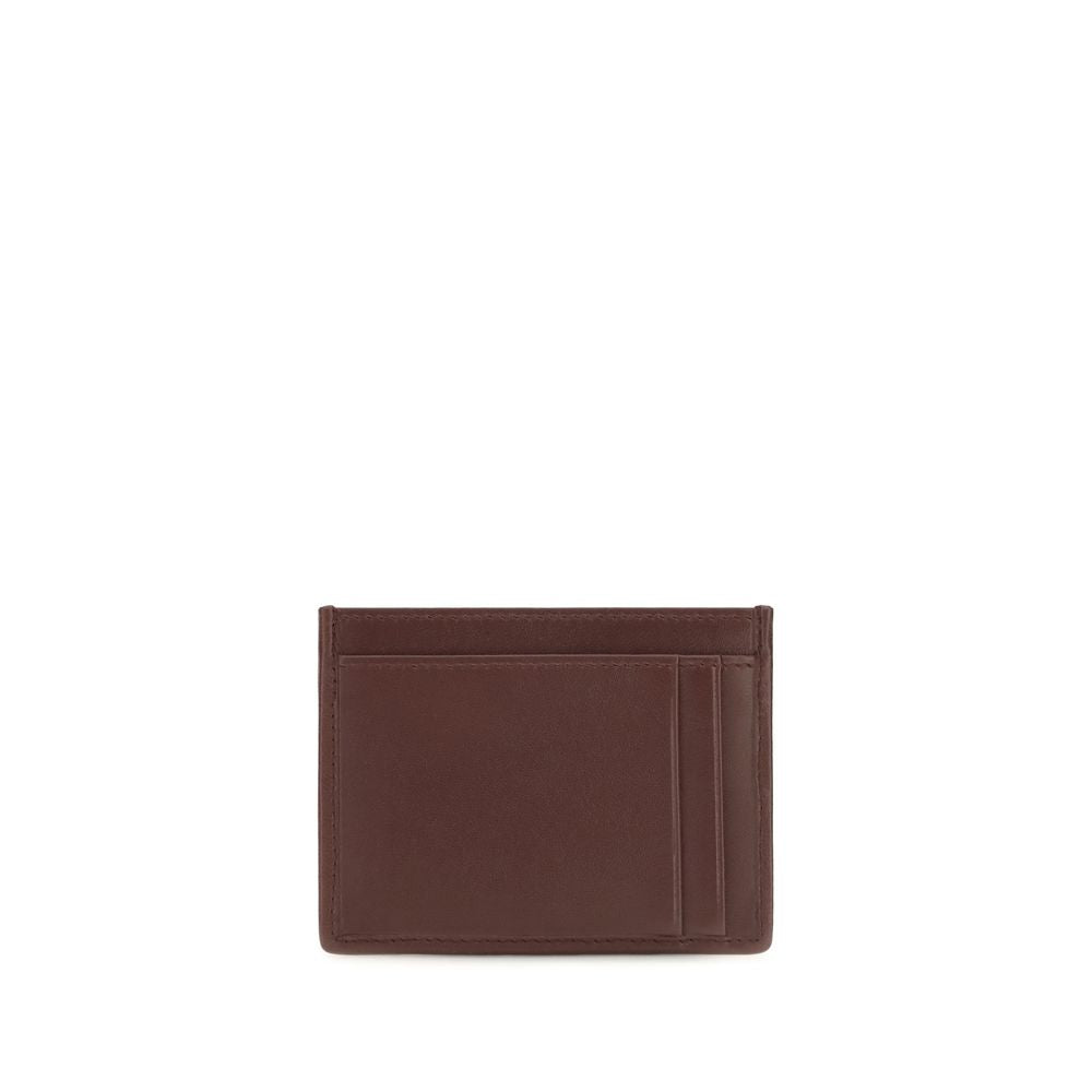 Cardholder Wallet by Miu Miu for women in nappa lamb leather bordeaux showcases a discerning silhouette, artfully capturing the essence of Nappa Lamb Leather Cardholder Wallet with its functional card-organization compact-design.