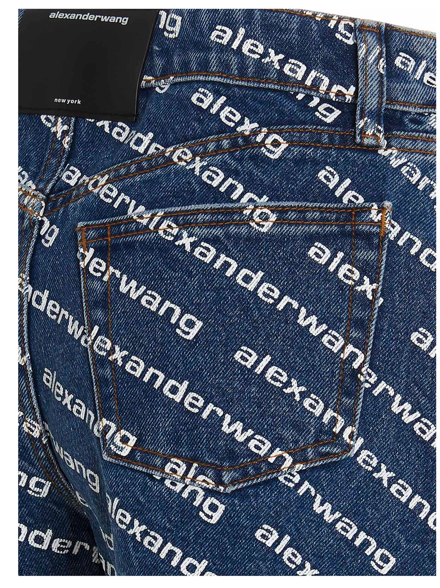 Denim Shorts by DENIM X ALEXANDER WANG for women in denim cotton blue & print features an magnificent silhouette, showcasing a magnificent with a short and high rise for a premium, sophisticated aesthetic.