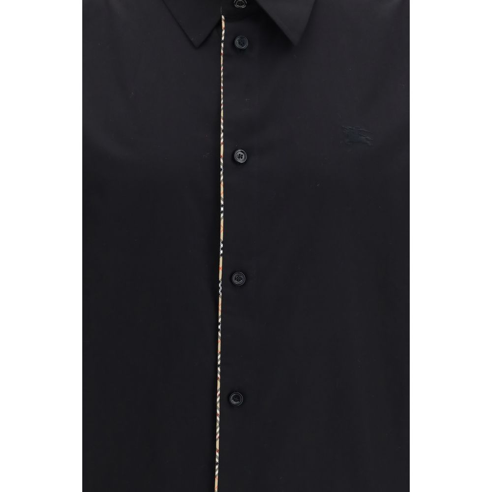 Dress Shirt by Burberry for men in cotton black presents a discerning silhouette, showcasing a sophisticated and for a truly discerning finish.