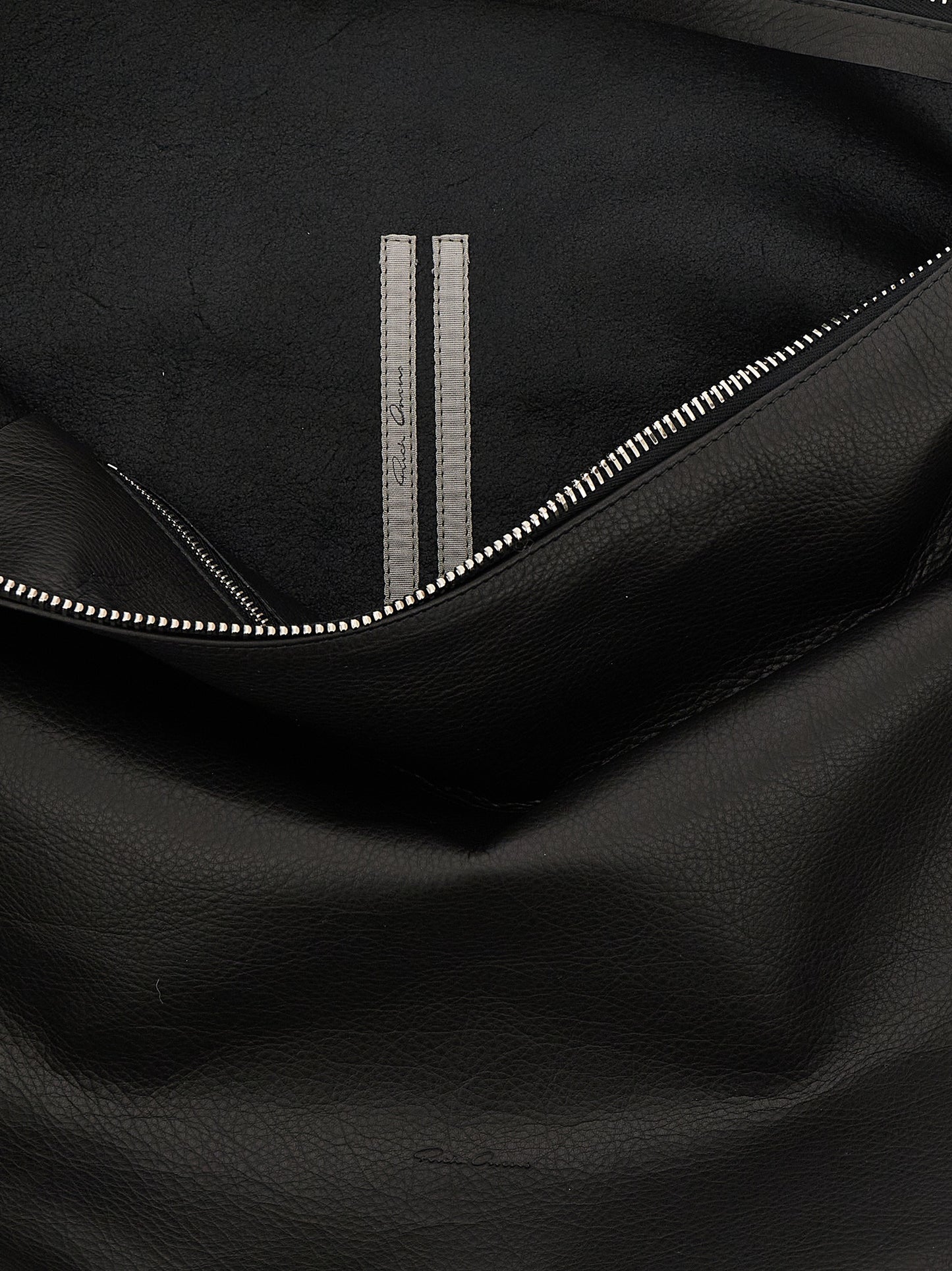 Shoulder Bag by Rick Owens for women in calfskin leather black features a effortless chic silhouette with a secure snap, zipper & hook, ample , and versatile shoulder-strap & handle for a effortless chic finish.